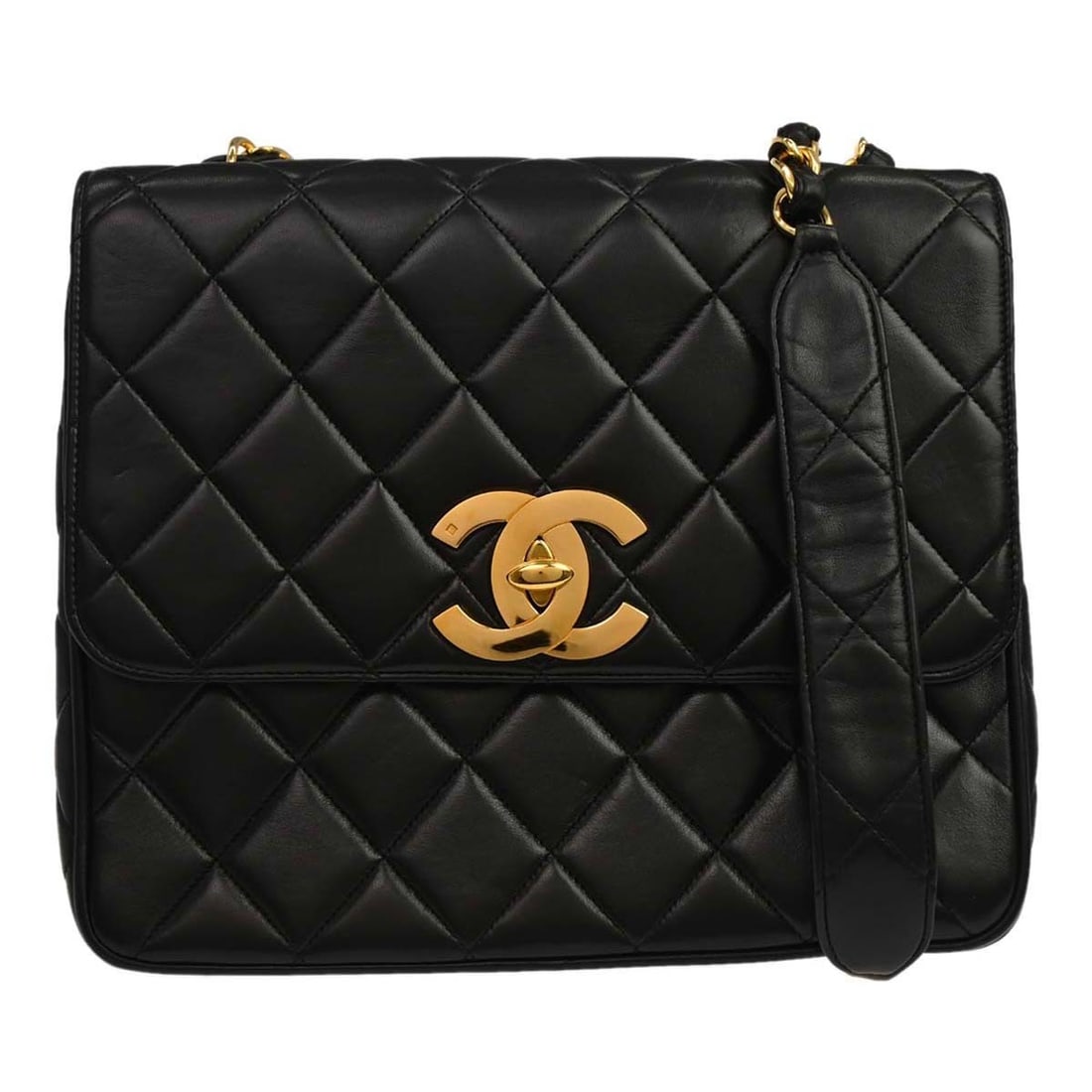 CHANEL Black Lambskin Shoulder Flap Bag: CHANEL Black Lambskin Shoulder Flap Bag This Chanel shoulder bag features a classic straight flap design crafted from luxurious black lambskin leather. The medium-sized bag is accented with practical 
