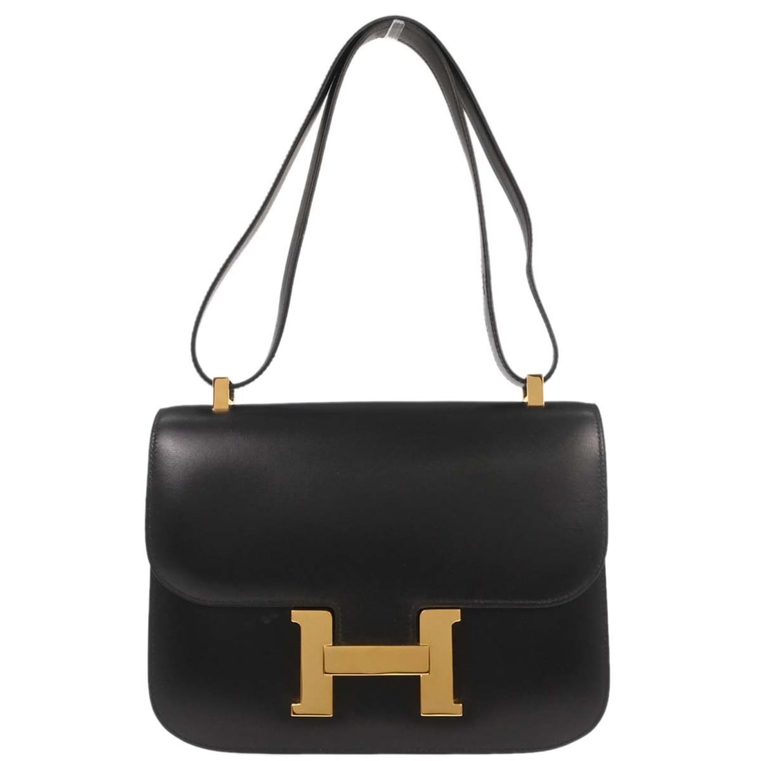 Black Leather Hermes Constance 23 Shoulder Bag with Adjustable Strap: Black Leather Hermes Constance 23 Shoulder Bag with Adjustable Strap This Hermes Constance 23 shoulder bag features a sleek black box calf leather exterior and is designed with a versatile shoulder st