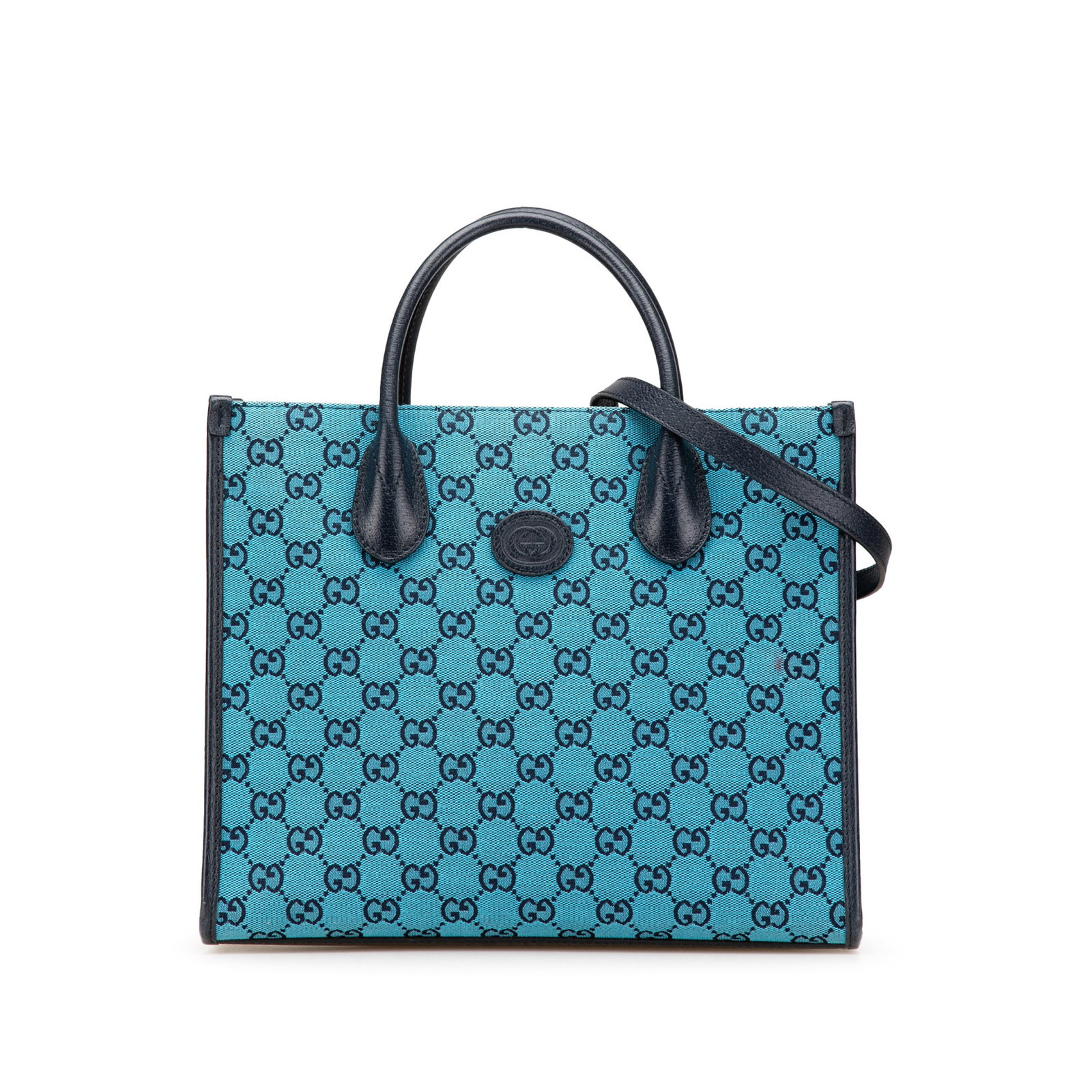 Gucci Small GG Canvas Tote Bag with Interlocking G Design: Gucci Small GG Canvas Tote Bag with Interlocking G Design The Gucci Small GG Canvas Interlocking G Tote is a stylish and practical satchel crafted from durable canvas with leather trim. This tote feat