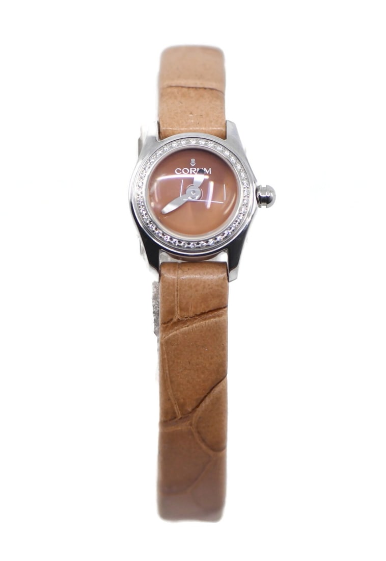 Corum Bubble Mini Diamond Watch L137/03602 Stainless Steel with Box and Papers: Corum Bubble Mini Diamond Watch L137/03602 Stainless Steel with Box and Papers Presenting the exquisite Corum Bubble Mini Diamond Stainless Steel Watch (Model: L137/03602). This elegant wristwatch fea