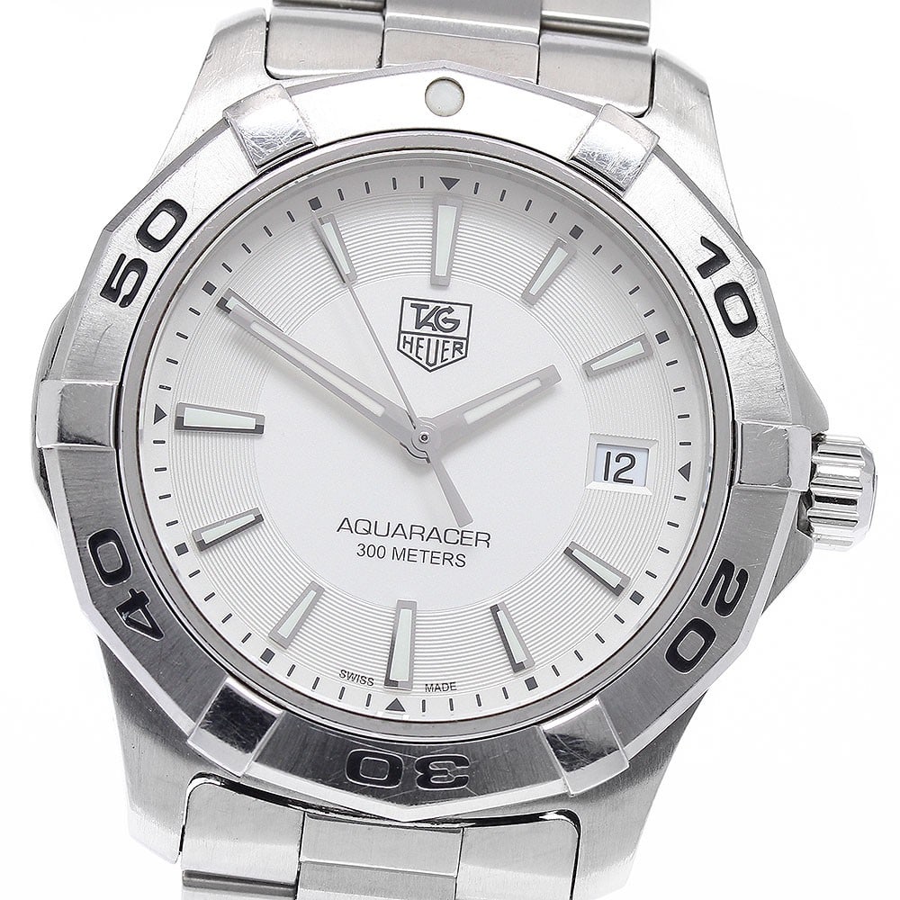 TAG Heuer Aquaracer Quartz Date Men's Stainless Steel Watch WAP1111: TAG Heuer Aquaracer Quartz Date Men's Stainless Steel Watch WAP1111 This TAG Heuer Aquaracer Date Quartz men's wristwatch features a stainless steel case and bracelet, with a silver dial and a date di