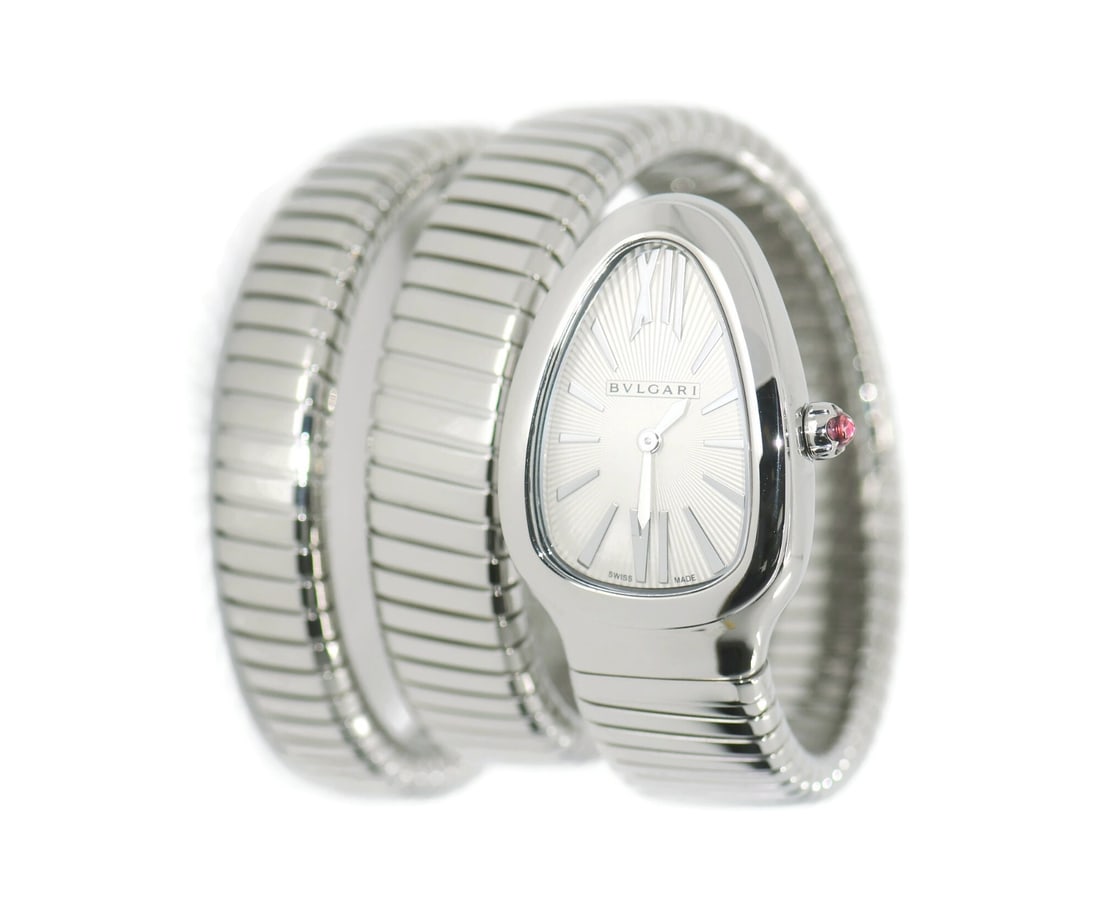 Bvlgari Serpenti 101911 Quartz Stainless Steel Ladies Watch with Box and Papers: Bvlgari Serpenti 101911 Quartz Stainless Steel Ladies Watch with Box and Papers This Bulgari Serpenti wristwatch features a stainless steel case and band with a silver dial and analog display. Designe