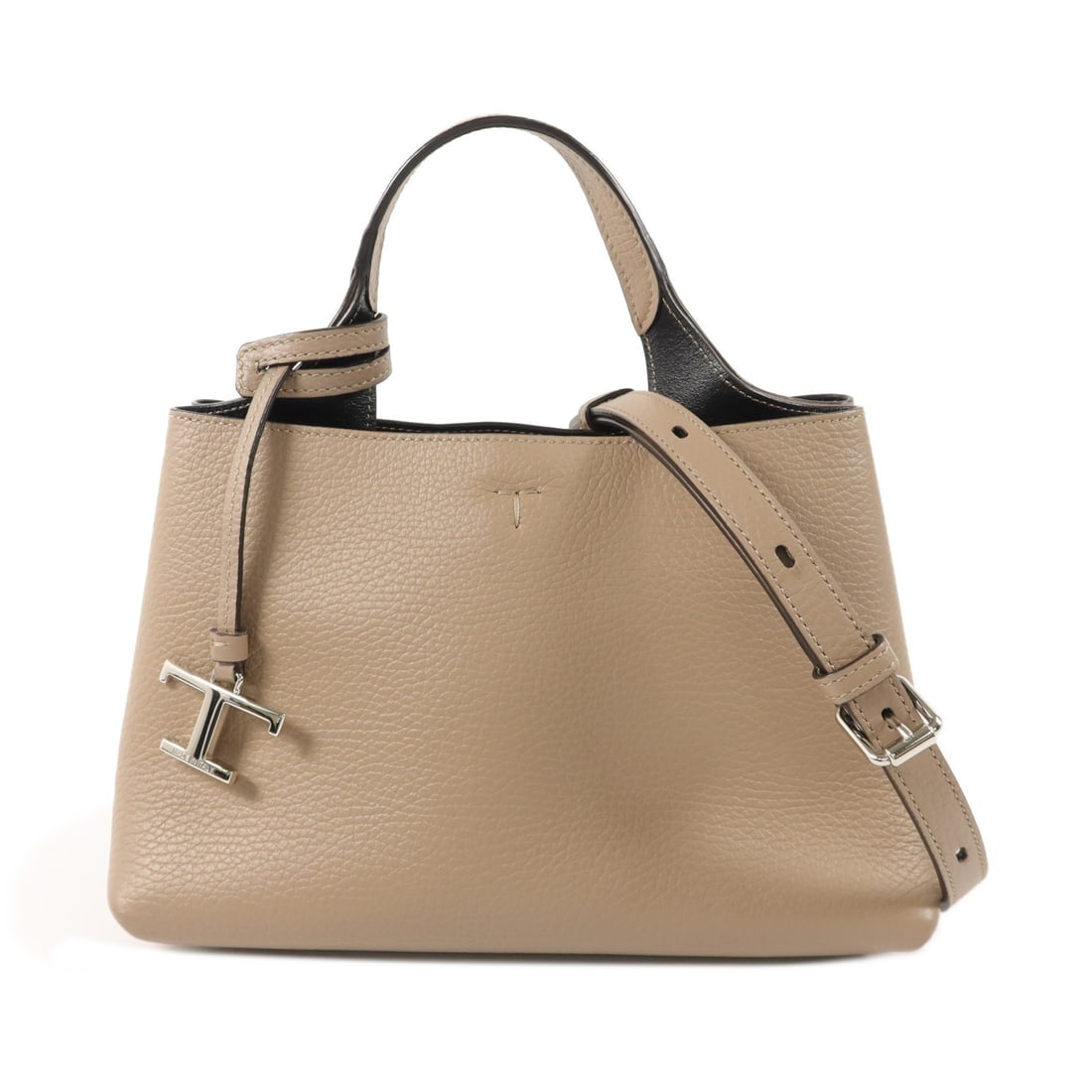 Tod's Beige Calfskin 2 Way Shoulder Bag: Tod's Beige Calfskin 2 Way Shoulder Bag This TOD'S 2-way shoulder bag is crafted from beige calfskin leather, offering both durability and a refined appearance. Designed for versatility, it can be wor