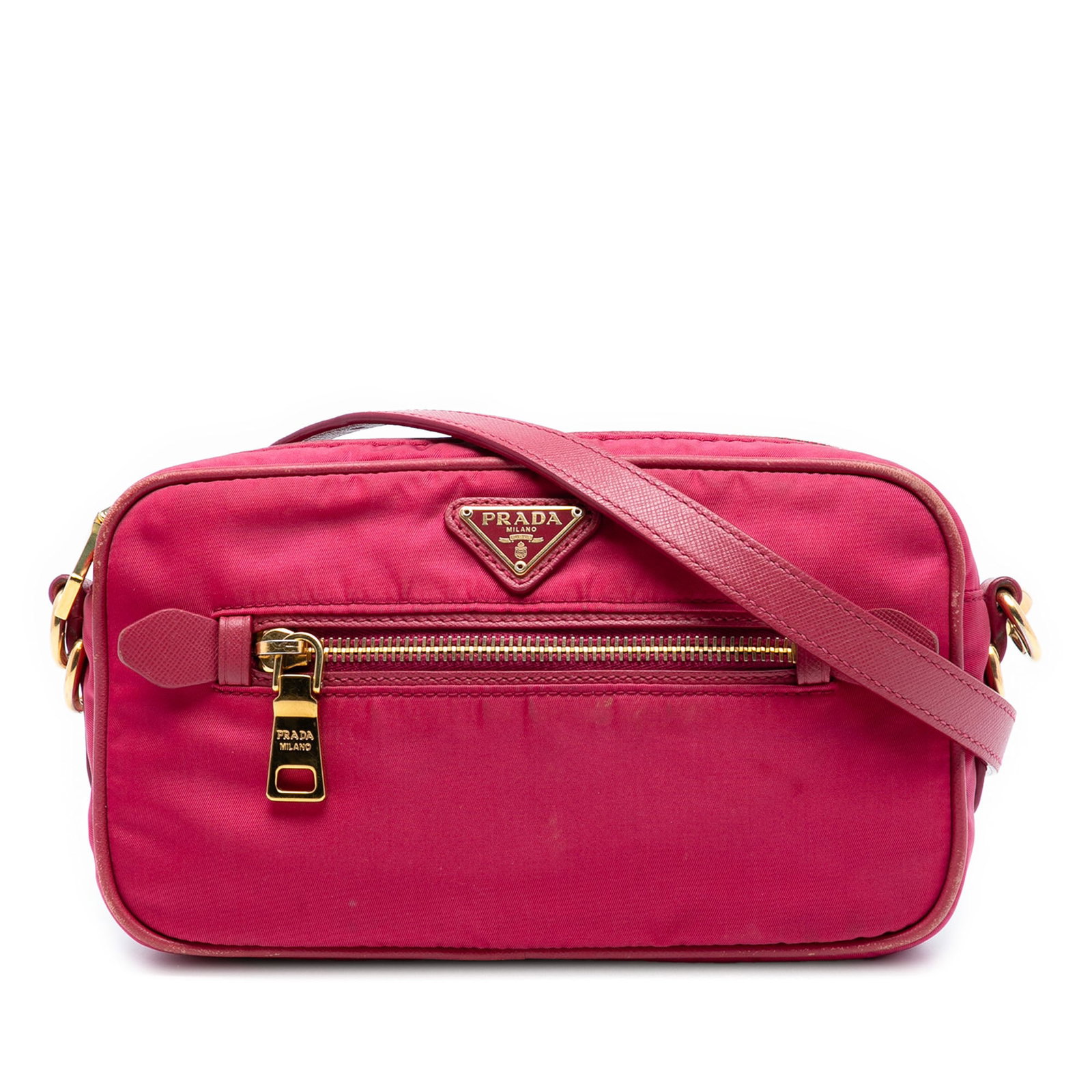 Pink Prada Tessuto Nylon Crossbody Bag with Adjustable Strap: Pink Prada Tessuto Nylon Crossbody Bag with Adjustable Strap This Prada Tessuto Crossbody bag features a pink nylon fabric body with a detachable and adjustable flat strap. It has a top zip closure, a