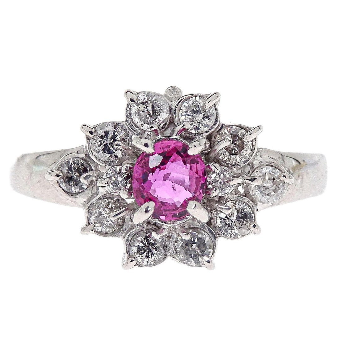 Platinum Pt900 Ring with Ruby and Diamond Accents Size 50: Platinum Pt900 Ring with Ruby and Diamond Accents Size 50 This vintage ring features a round ruby as the main stone, accented by diamonds. Crafted from platinum with Pt900 purity, it has a silver tone