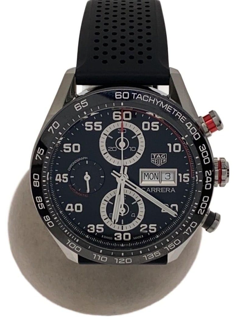 TAG Heuer Carrera Men's Swiss Wristwatch CBN2A1AA: TAG Heuer Carrera Men's Swiss Wristwatch CBN2A1AA This TAG Heuer Carrera CBN2A1AA men's wristwatch is a Swiss-made timepiece designed for men. It features a robust case with slight signs of use, refle