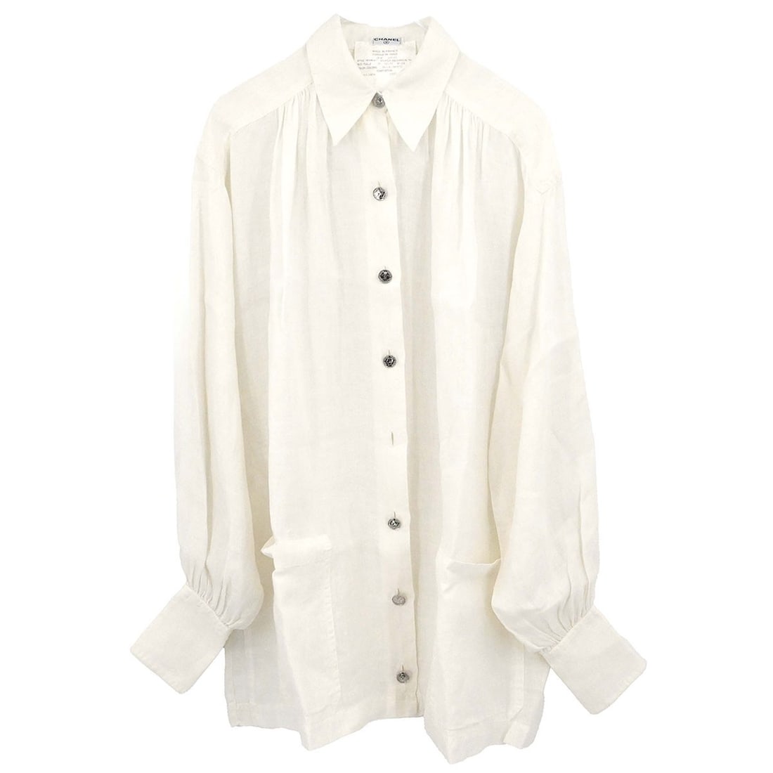 CHANEL White Linen Long Sleeve Collared Blouse Size 38: CHANEL White Linen Long Sleeve Collared Blouse Size 38 This vintage Chanel blouse is crafted from 100% linen in a classic white color. Featuring a collared neckline and long sleeves, it offers a timel
