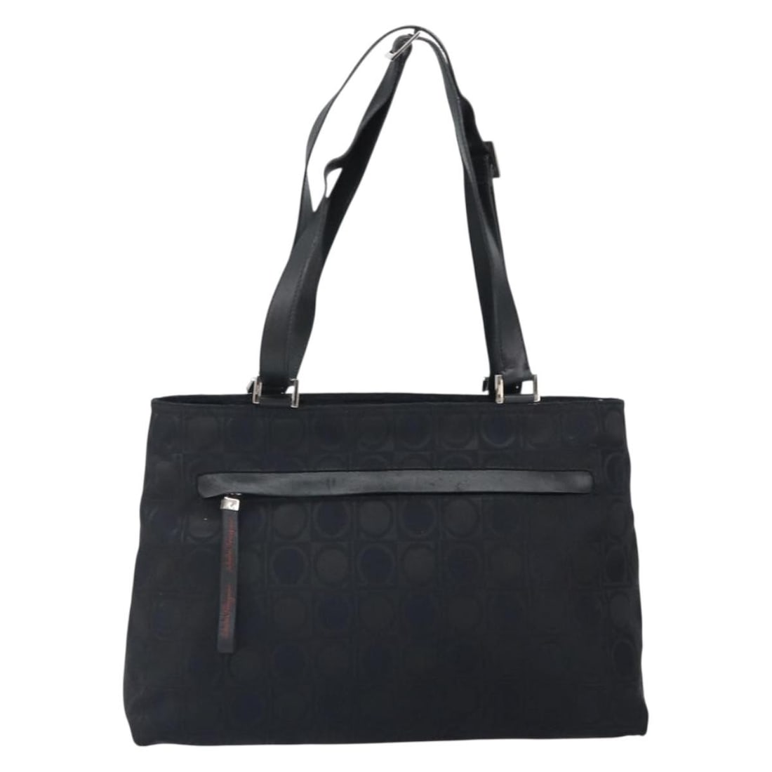 Gancini Black Nylon Tote Bag by Salvatore Ferragamo: Gancini Black Nylon Tote Bag by Salvatore Ferragamo This Salvatore Ferragamo Gancini Tote is crafted from black nylon and designed for women. It features leather accents and a spacious interior, makin