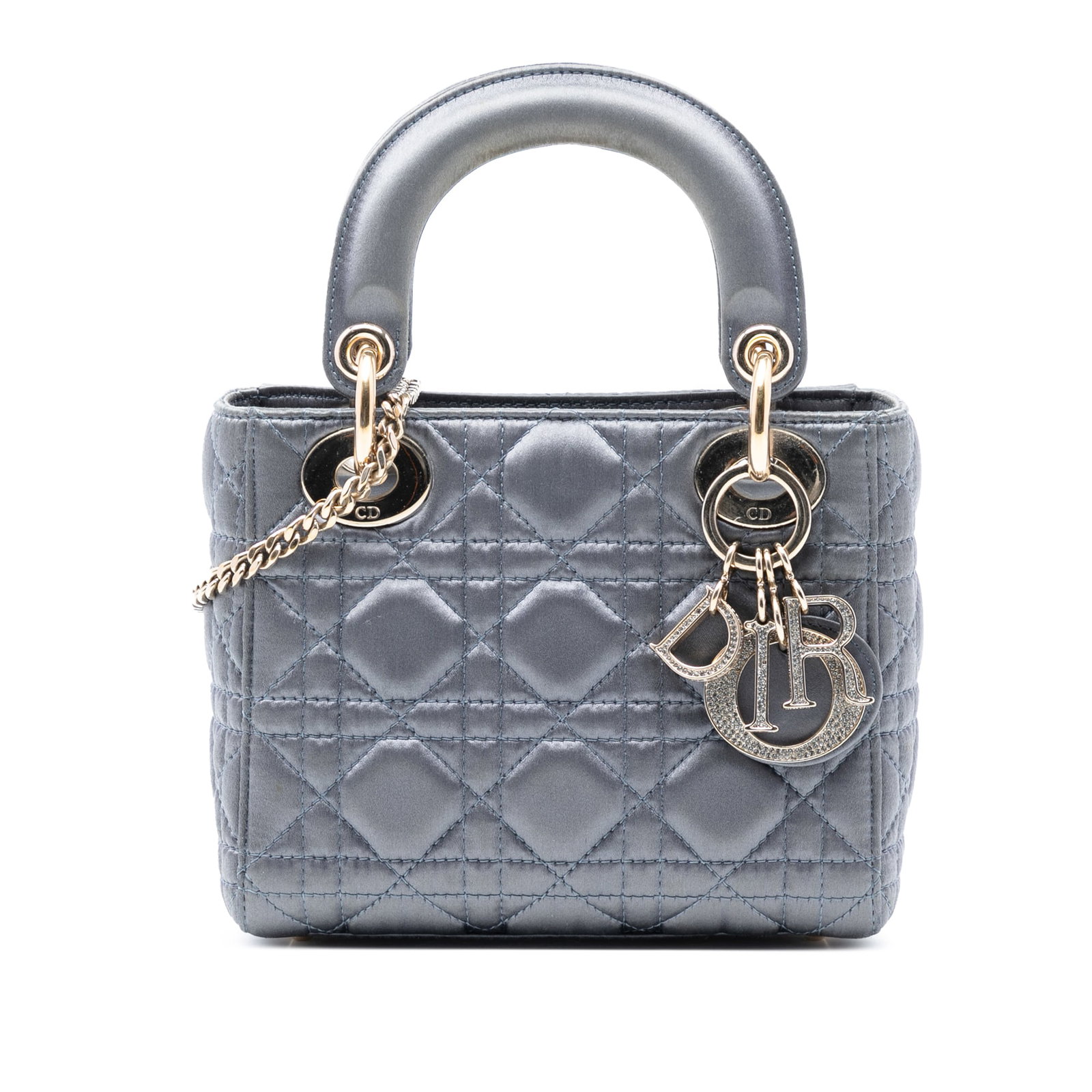 Dior Lady Dior Mini Bag Satin Cannage with Swarovski Crystal Embellishments: Dior Lady Dior Mini Bag Satin Cannage with Swarovski Crystal Embellishments This Lady Dior handbag features a quilted satin exterior adorned with Swarovski crystal embellishments. It is designed with 