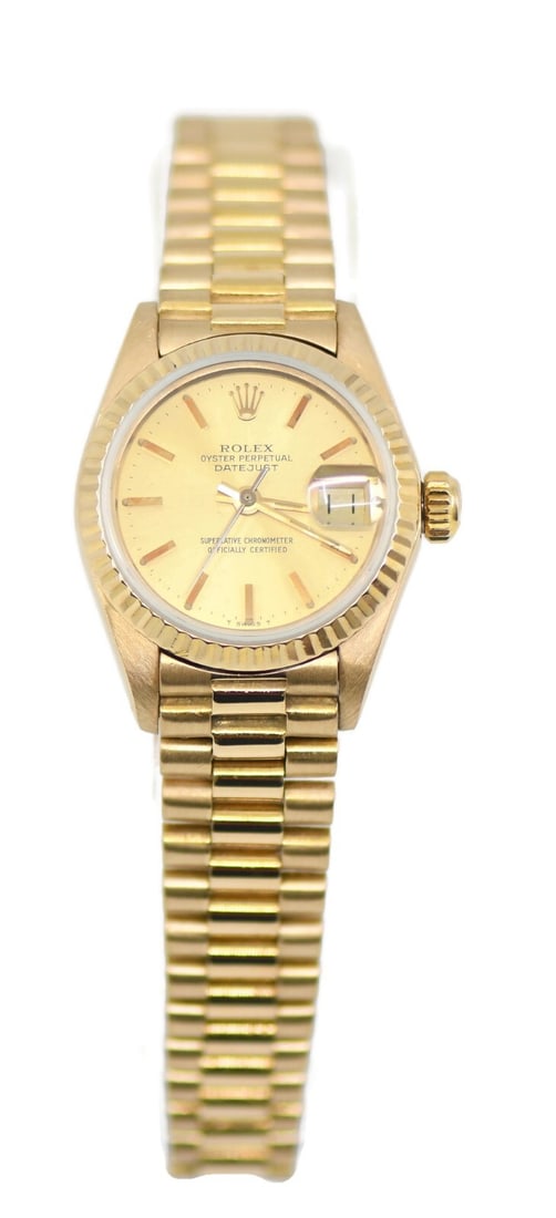 Rolex Datejust 18K Yellow Gold Wristwatch Ref 6917 Champagne Dial: Rolex Datejust 18K Yellow Gold Wristwatch Ref 6917 Champagne Dial Discover the timeless elegance of the Rolex Datejust, a stunning 18K yellow gold wristwatch that effortlessly combines luxury with fun