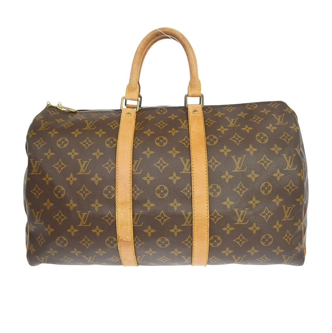 Keepall Travel Bag by Louis Vuitton in Monogram Canvas Brown: Keepall Travel Bag by Louis Vuitton in Monogram Canvas Brown This Louis Vuitton Keepall Bag features the iconic monogram canvas in brown and is designed for unisex use. It is a vintage piece showing s