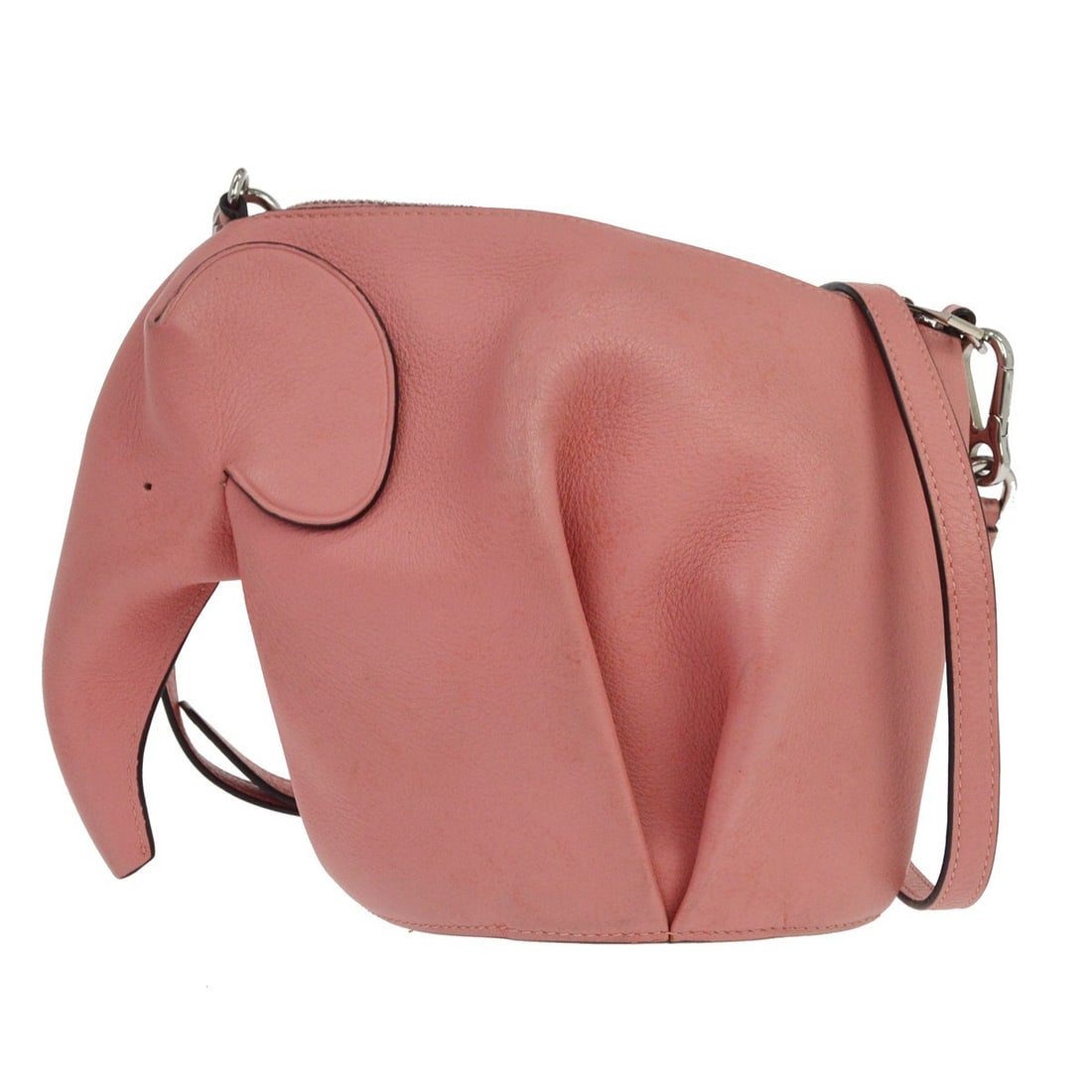 Pink Leather Elephant Shaped Crossbody by Loewe Spain: Pink Leather Elephant Shaped Crossbody by Loewe Spain This Loewe Elephant Crossbody Bag features a playful elephant silhouette crafted from pink leather. Designed for women, it offers a compact and st