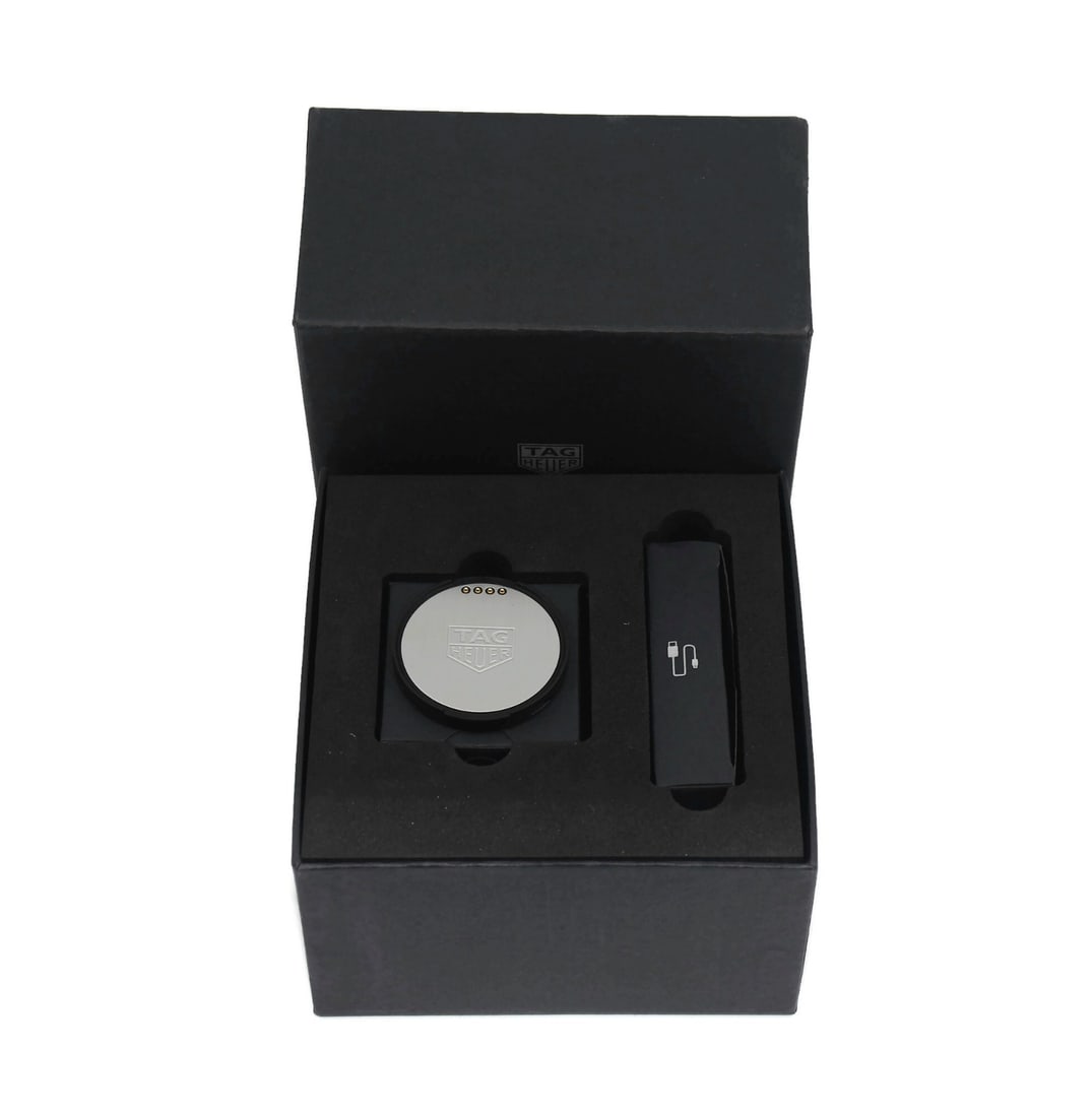 Charging Accessory Kit for TAG Heuer Connected Smartwatch: Charging Accessory Kit for TAG Heuer Connected Smartwatch This is a pre-owned TAG Heuer Connected charge kit, designed for use with TAG Heuer Connected watches. Manufactured in Switzerland, this authe