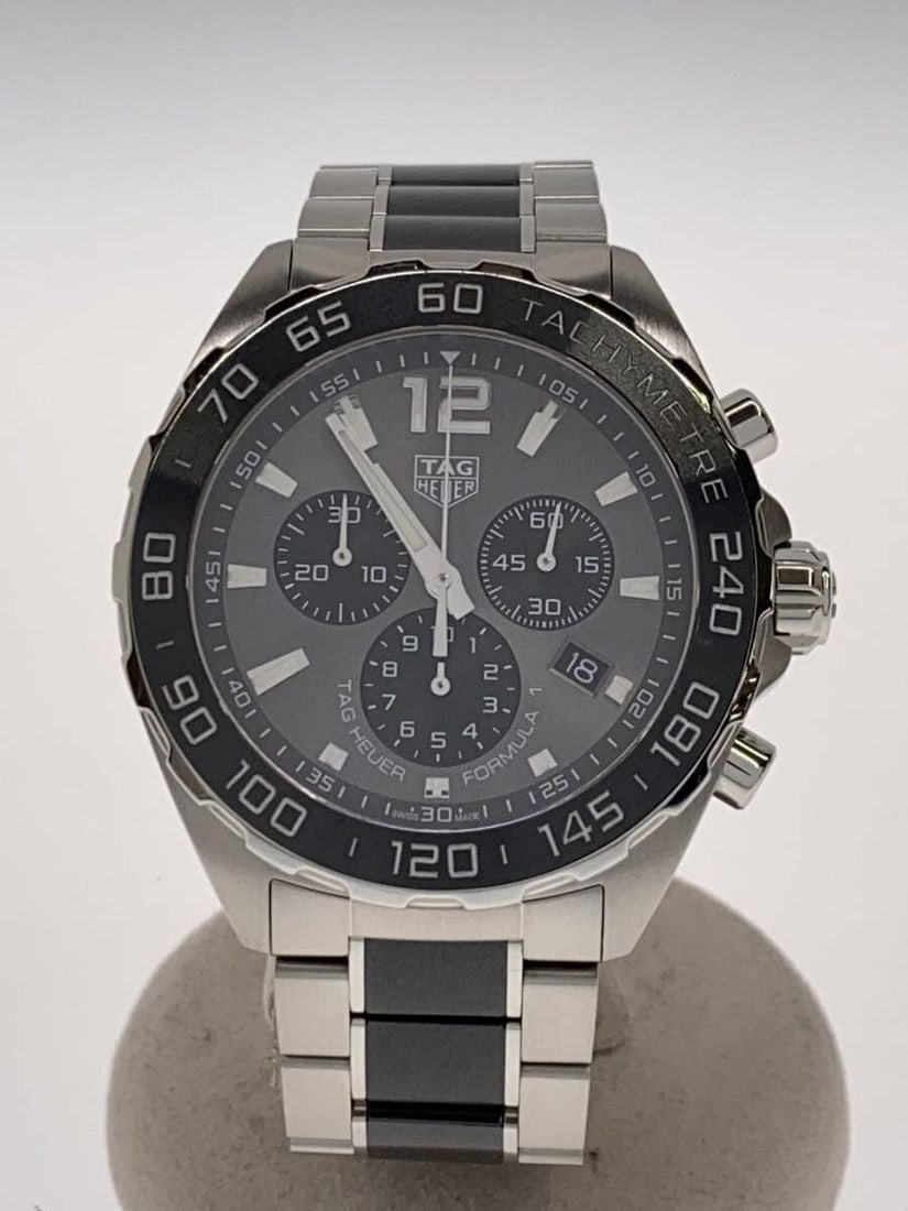 TAG Heuer Formula 1 stainless steel men's wristwatch CAZ1011: TAG Heuer Formula 1 stainless steel men's wristwatch CAZ1011 This TAG Heuer Formula 1 CAZ1011 men's wristwatch features a stainless steel case and band in a silver tone. Designed for men, it is a Swis