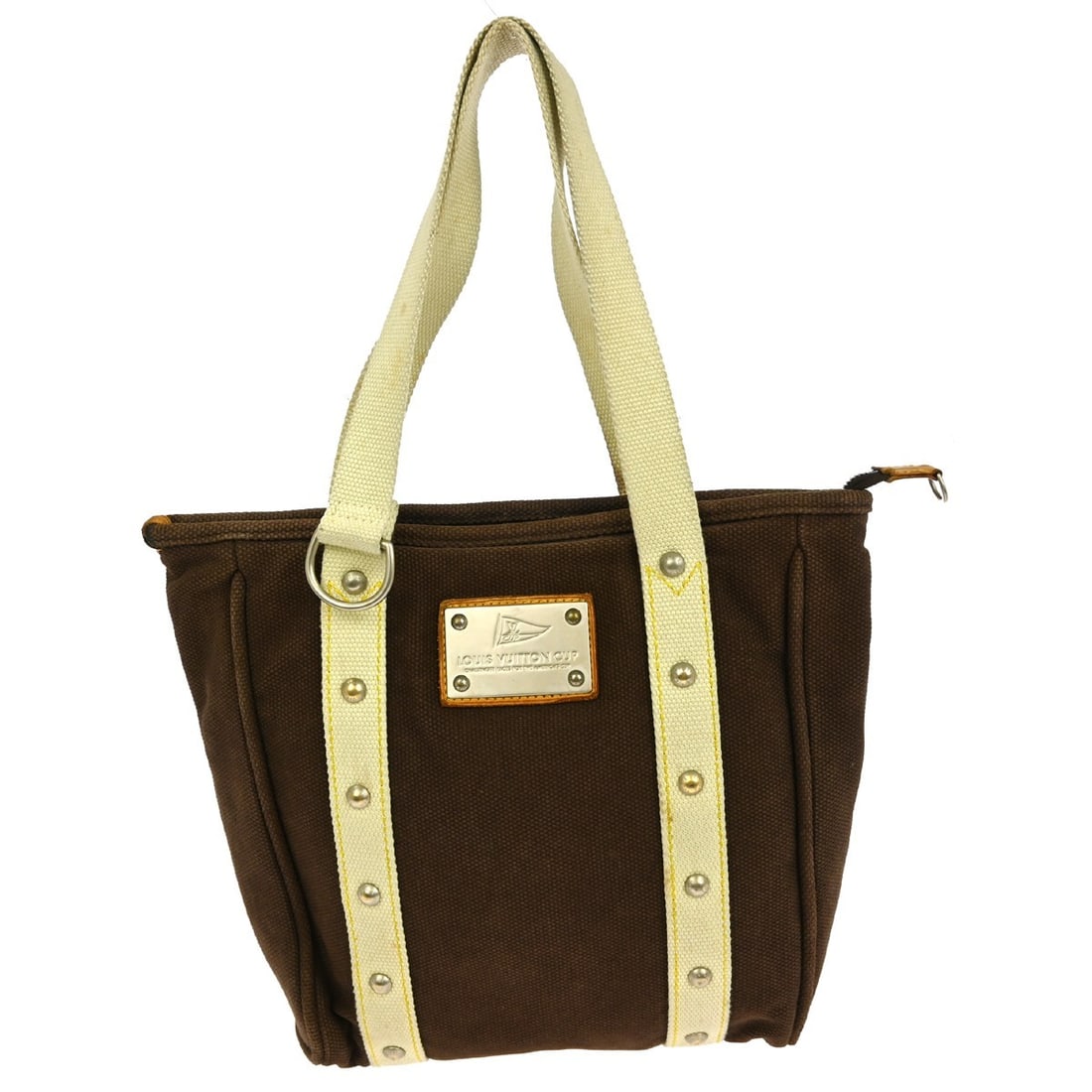 Louis Vuitton Antigua Cabas MM Medium Brown Canvas Tote Bag M80663: Louis Vuitton Antigua Cabas MM Medium Brown Canvas Tote Bag M80663 This Louis Vuitton Antigua Cabas MM tote bag features a brown canvas exterior with double white canvas handles. The bag offers a zip 