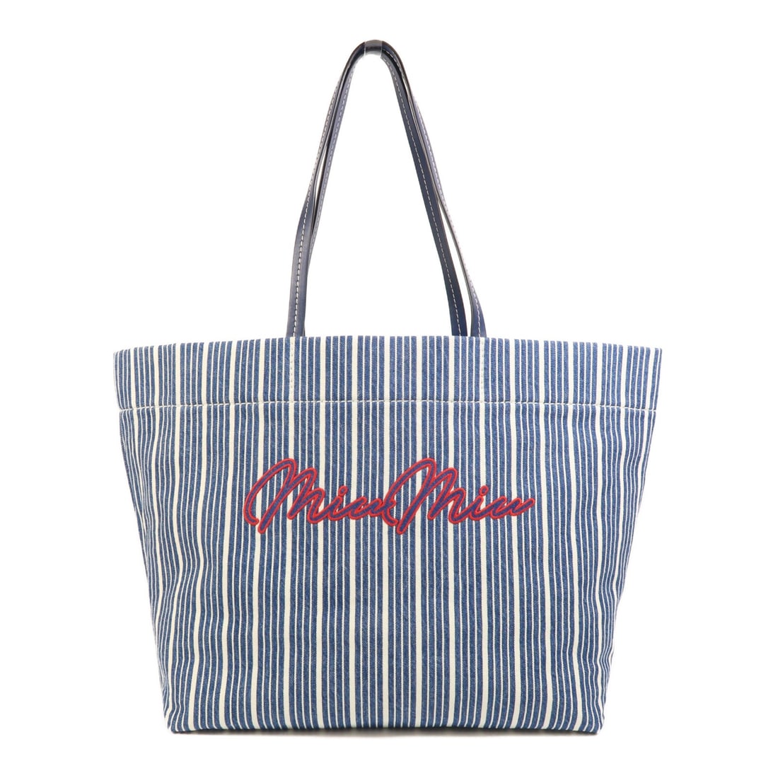 Miu Miu Denim Blue Shoulder Tote Bag with SHW: Miu Miu Denim Blue Shoulder Tote Bag with SHW This stylish tote bag from Miu Miu showcases a chic denim exterior in a vibrant blue hue. With a height of 13.0 inches, a depth of 6.3 inches, and a lengt