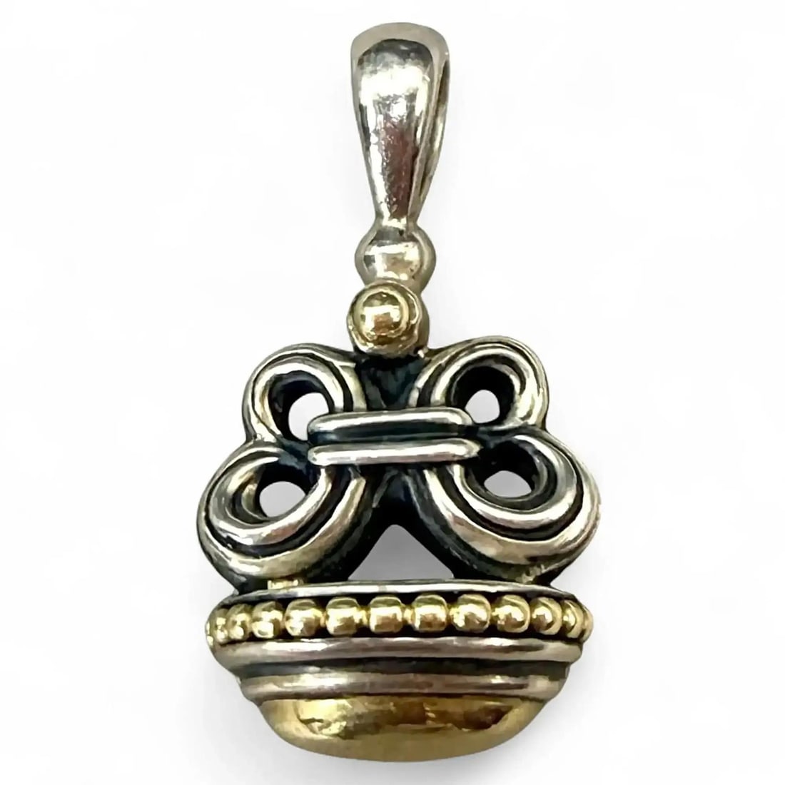 Caviar Wheat Pendant in Sterling Silver and 18K Gold by Lagos: Caviar Wheat Pendant in Sterling Silver and 18K Gold by Lagos This vintage Lagos Caviar Wheat pendant is crafted from 925 sterling silver and features 18k yellow gold Caviar beads accenting a classic 