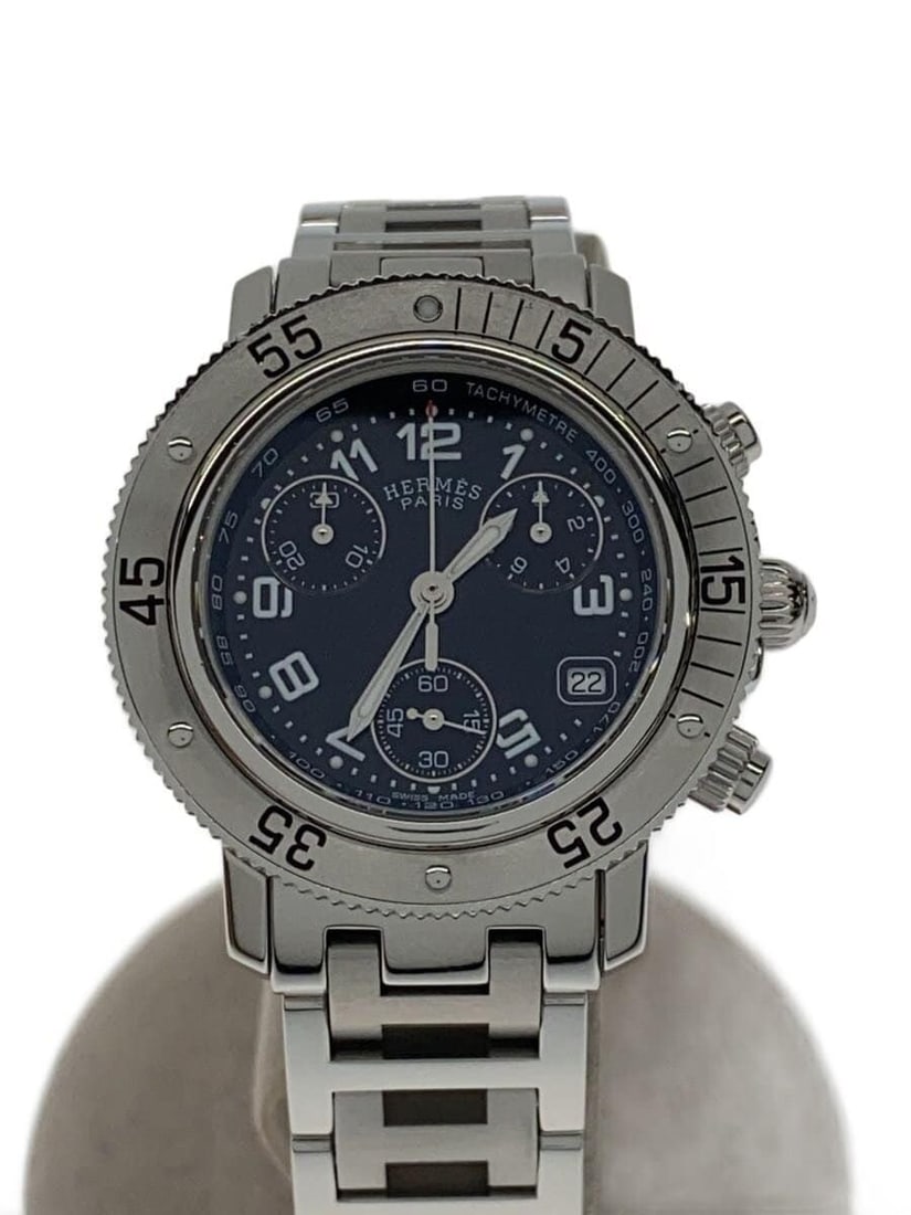 Hermes Clipper Quartz Men's Wristwatch CL2.310: Hermes Clipper Quartz Men's Wristwatch CL2.310 This HERMES Clipper Quartz CL2.310 is a men's wristwatch crafted in Switzerland. The watch features a round case with a classic design, offering a reliab