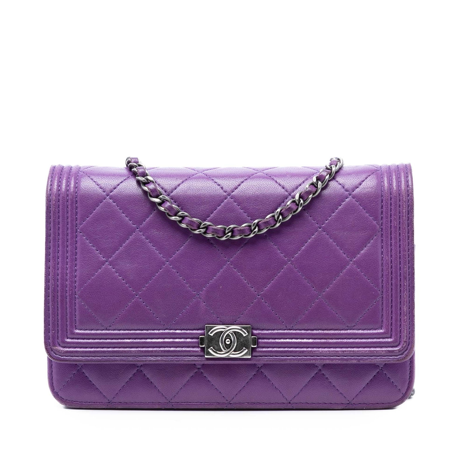 Chanel Boy Purple Quilted Lambskin Wallet on Chain Bag: Chanel Boy Purple Quilted Lambskin Wallet on Chain Bag This Chanel Boy wallet on chain showcases a quilted lambskin leather body in purple, complemented by a leather-woven chain strap and a front flap