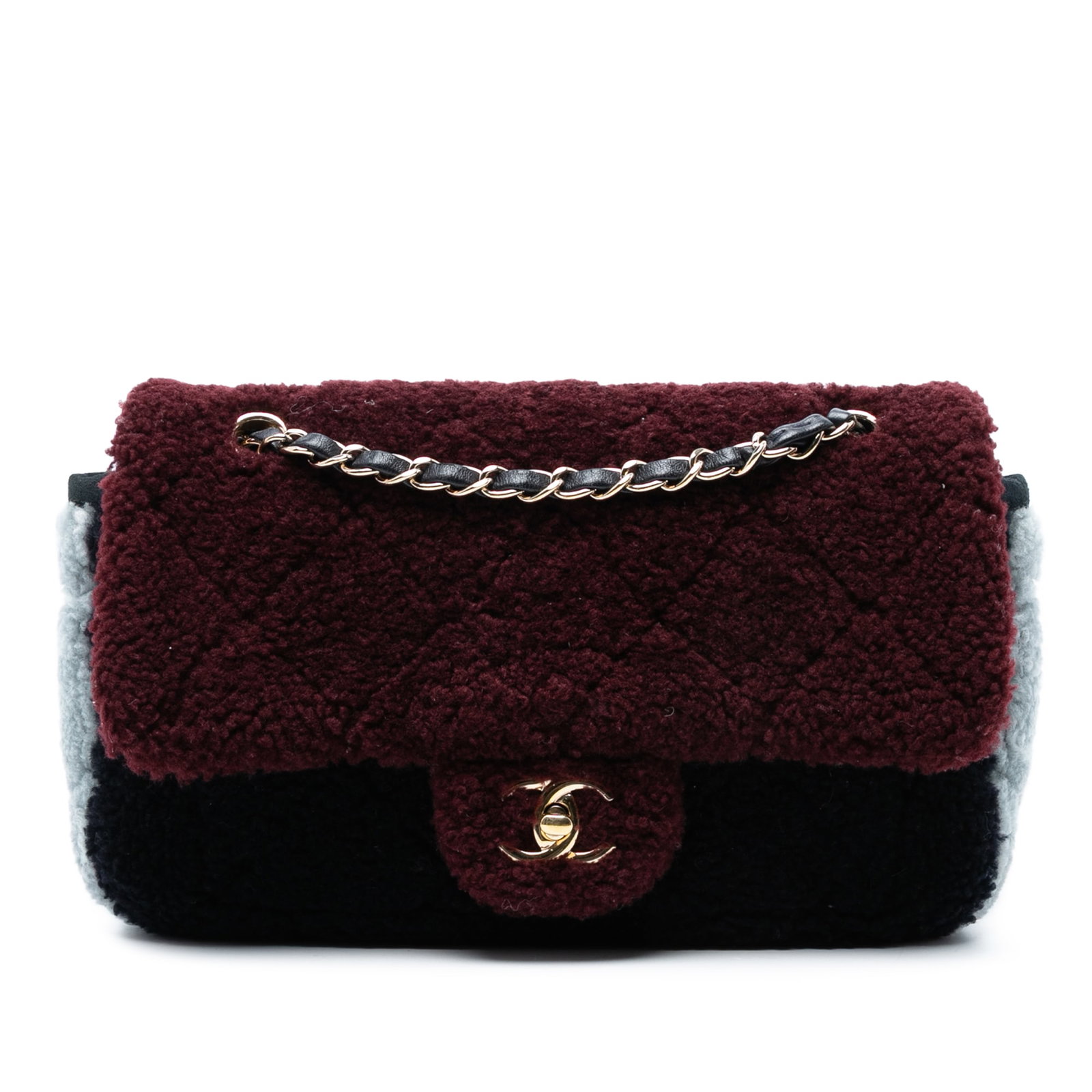 Chanel Medium Tricolor CC Quilted Shearling Flap Bag: Chanel Medium Tricolor CC Quilted Shearling Flap Bag This stunning Chanel Medium Tricolor CC Quilted Shearling Single Flap shoulder bag showcases a luxurious quilted shearling body complemented by a l