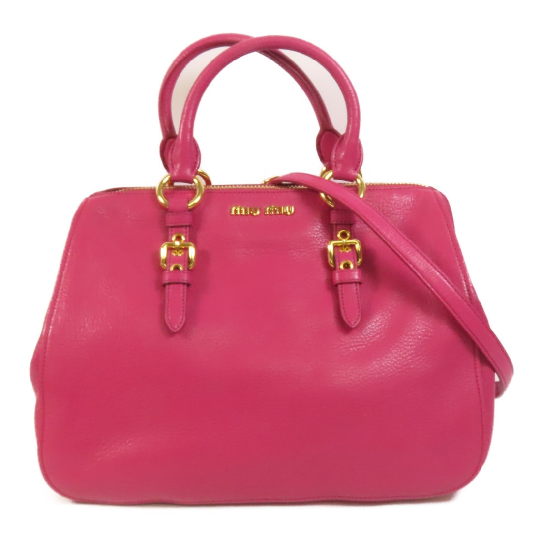 Miu Miu Pink Calfskin Leather Two Way Shoulder Bag with Gold Hardware: Miu Miu Pink Calfskin Leather Two Way Shoulder Bag with Gold Hardware This Miu Miu 2-way shoulder bag features pink calfskin leather and gold tone hardware. Designed for women, it offers versatile car