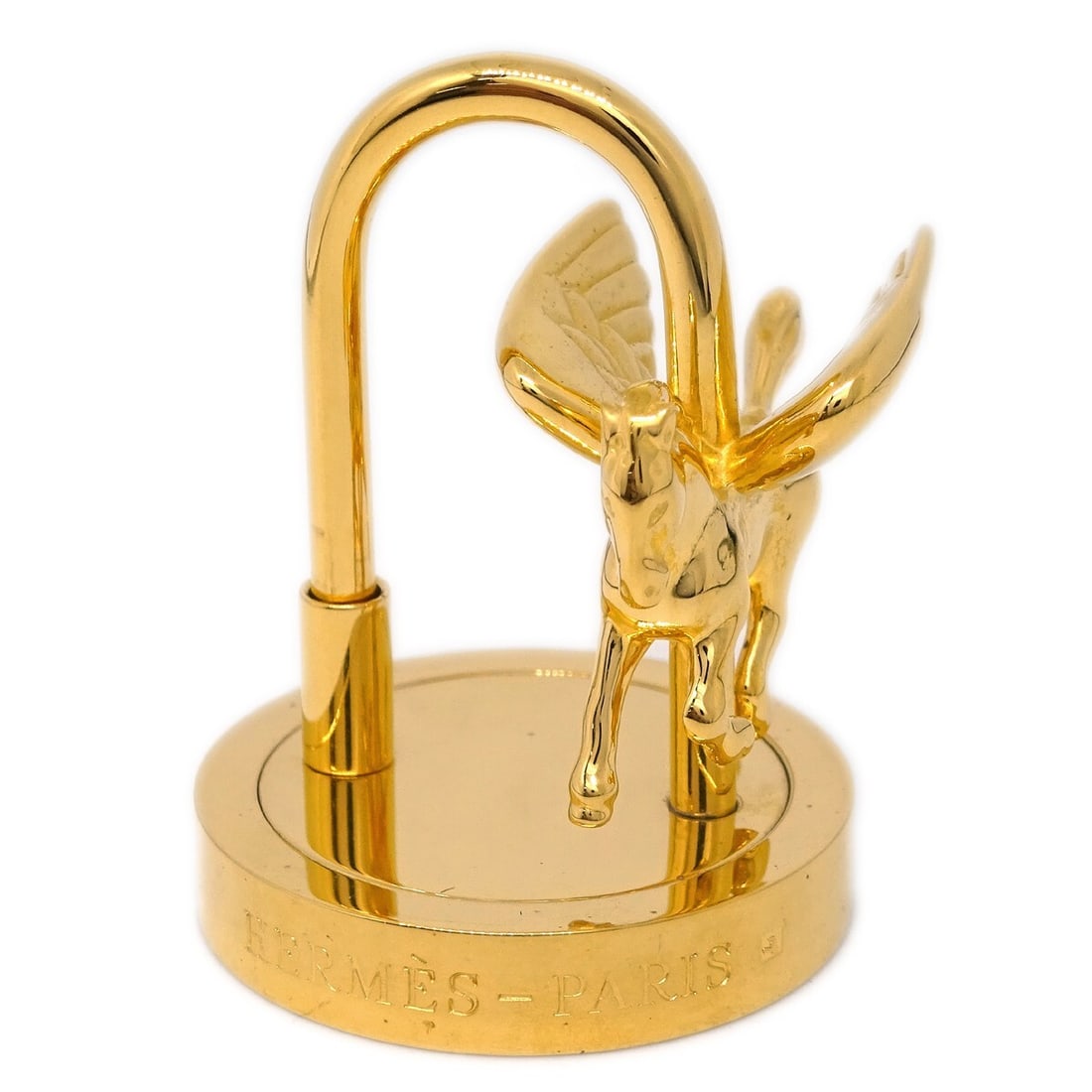 2007 Pegasus Cadena Charm by Hermes in Gold Tone: 2007 Pegasus Cadena Charm by Hermes in Gold Tone This is a Hermes 'Entrez dans la danse! Pegasus' charm from 2007, crafted in a gold tone finish. The piece is vintage and made in France. It is in very