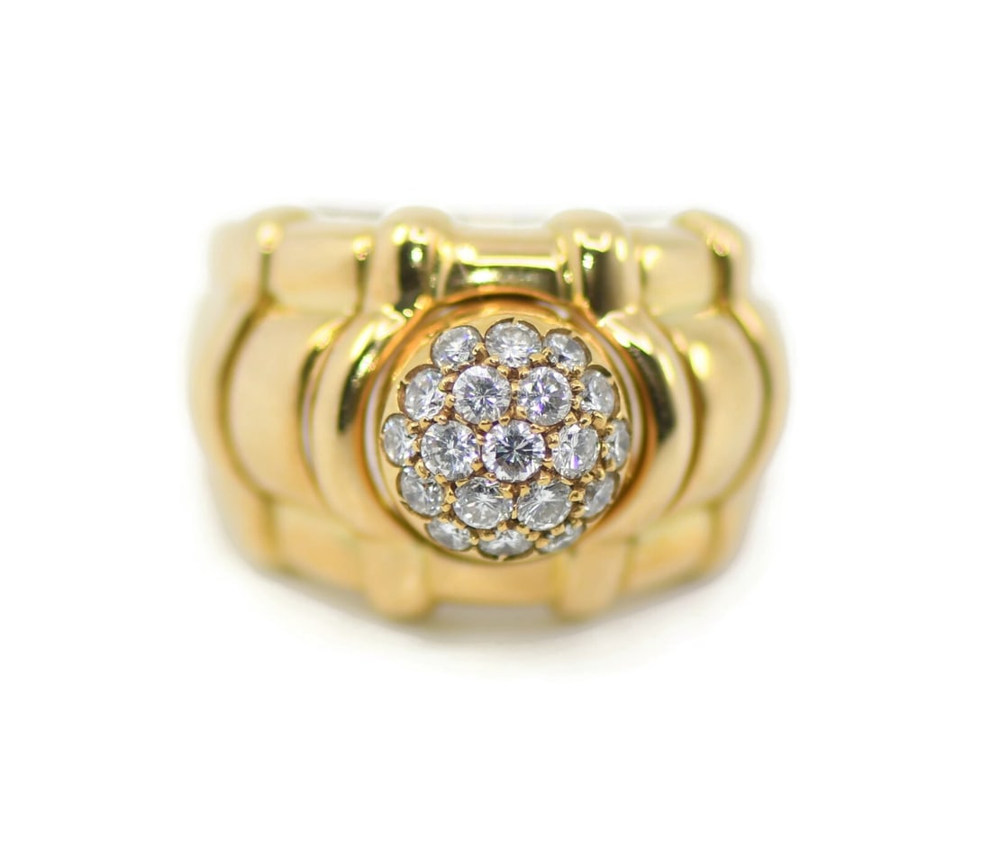 Piaget Interchangeable 18K Yellow Gold Diamond Ring Size 7.5: Piaget Interchangeable 18K Yellow Gold Diamond Ring Size 7.5 Elevate your jewelry collection with this stunning Piaget interchangeable ring, crafted from luxurious 18K yellow gold. This exquisite piec