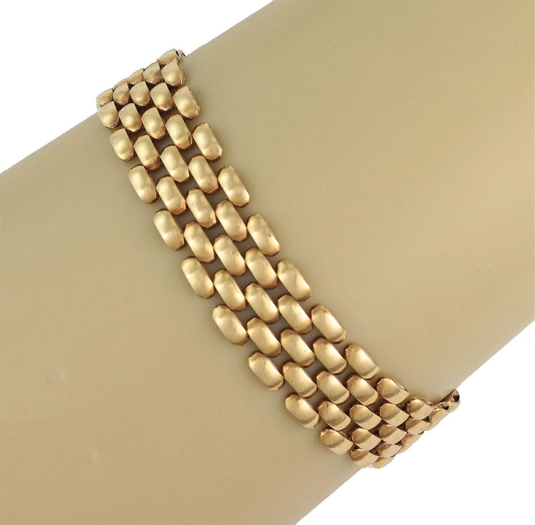 14k Yellow Gold Panther Link Bracelet 12mm Wide 7 Inch: 14k Yellow Gold Panther Link Bracelet 12mm Wide 7 Inch This 14k yellow gold bracelet features a wide, classic panther link design with a polished finish. The links are smooth and flexible, ensuring a 