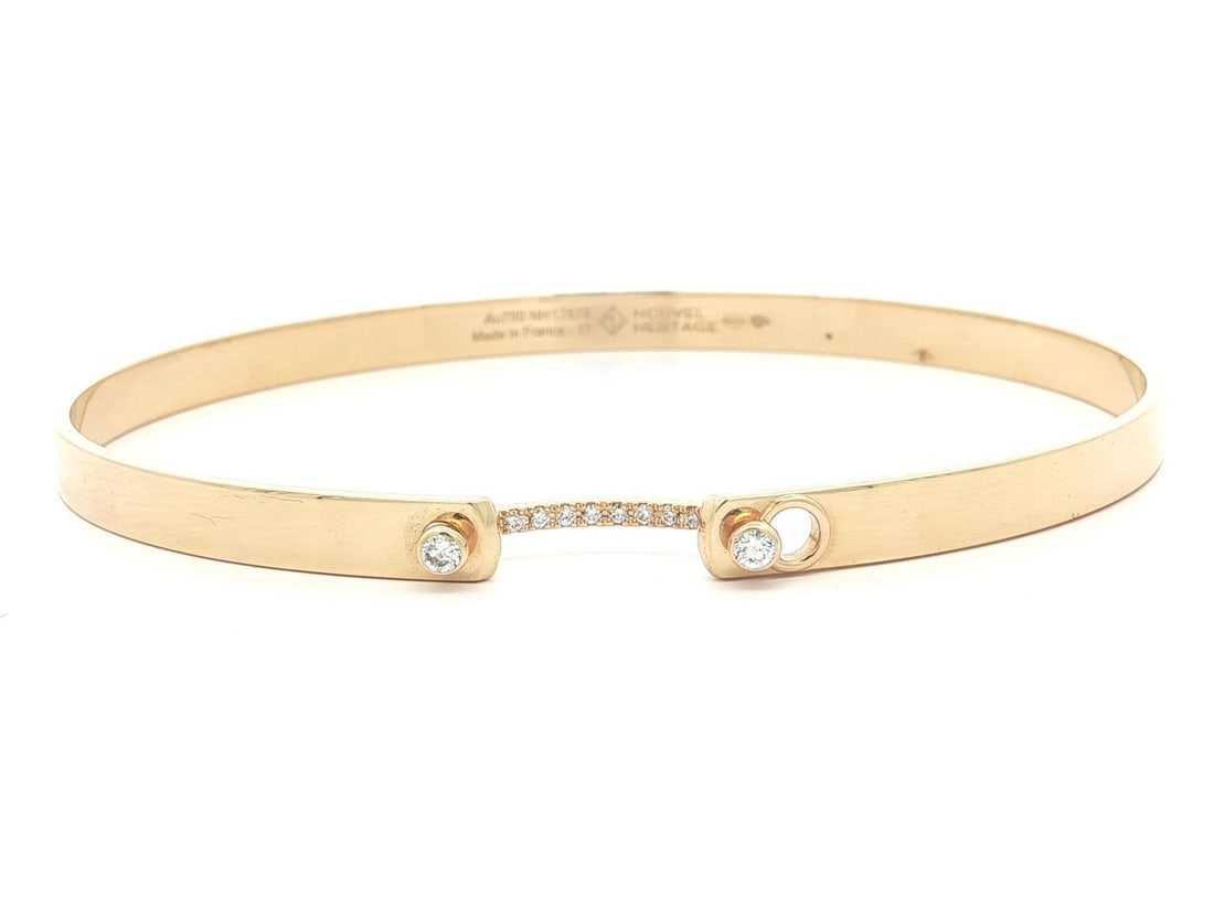 French 18k Yellow Gold Diamond Pave Bangle Bracelet: French 18k Yellow Gold Diamond Pave Bangle Bracelet This elegant bangle bracelet features a classic open design crafted from solid 18k yellow gold. Accented with numerous natural round brilliant cut d