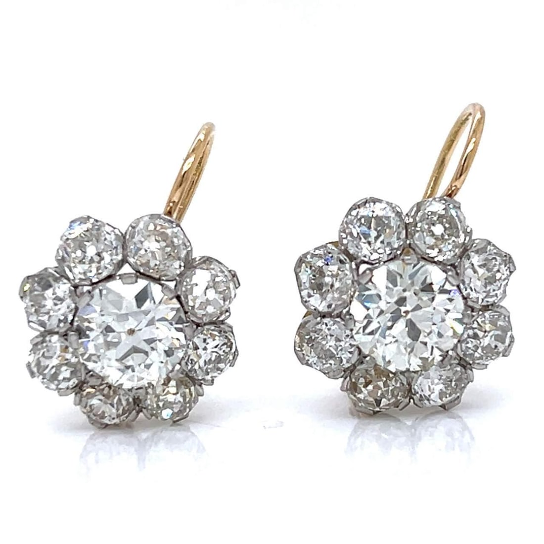 Platinum 18K Yellow Gold 8.40 Ct Diamond Earrings Stunning Design: Platinum 18K Yellow Gold 8.40 Ct Diamond Earrings Stunning Design These stunning earrings are crafted from a combination of platinum and 18K yellow gold, showcasing a total diamond weight of 8.40 cara
