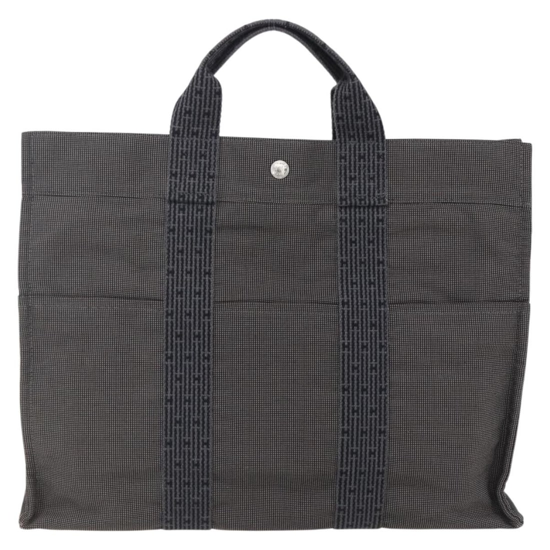 Hermes Herline Canvas Tote Bag Gray 42cm by 32cm by 10cm: Hermes Herline Canvas Tote Bag Gray 42cm by 32cm by 10cm Hermes Fourre-tout Herline is a female canvas tote bag in gray color, featuring a spacious design suitable for everyday use. The bag shows sign