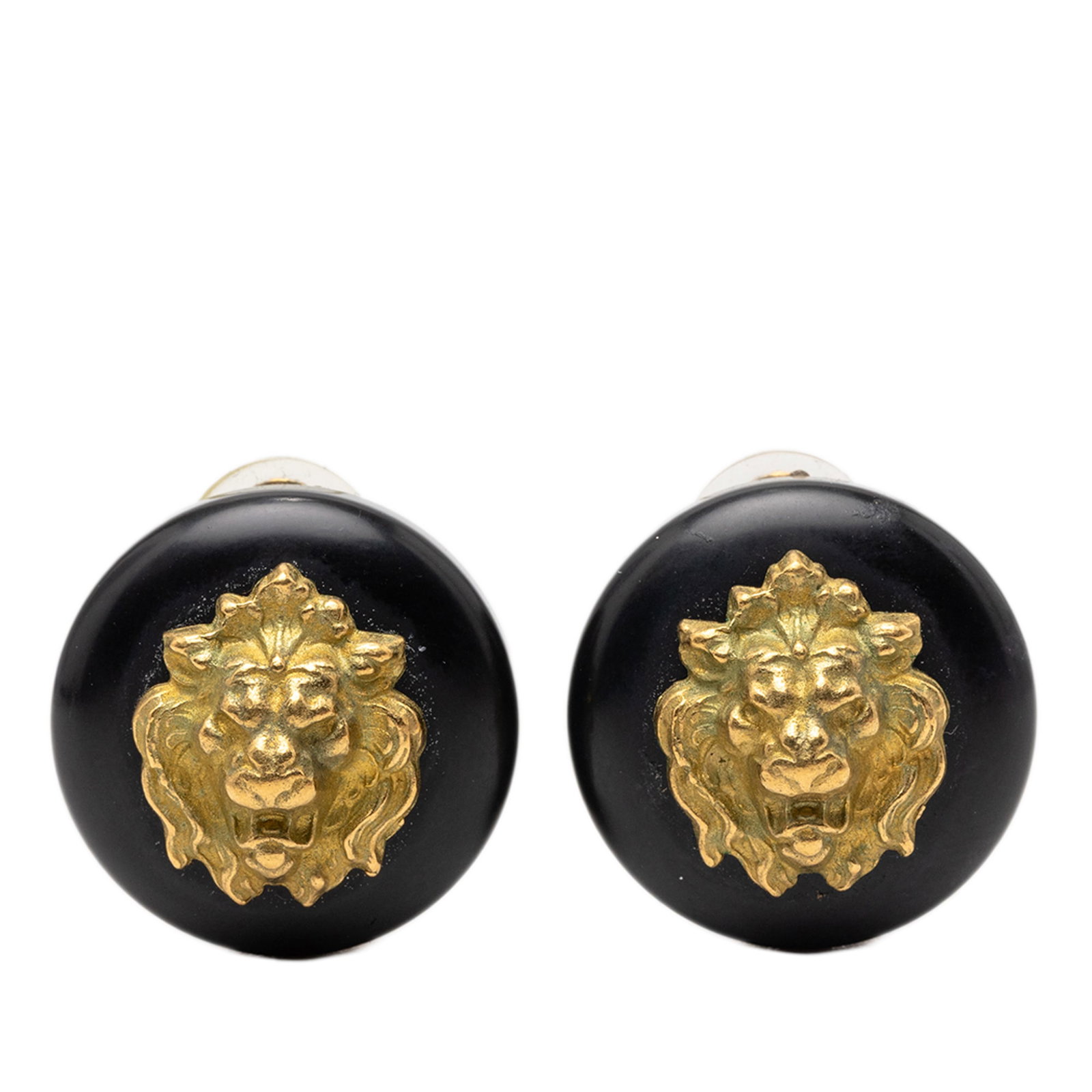 Chanel Lion Head Clip Earrings in Black Resin and Gold Plated Metal: Chanel Lion Head Clip Earrings in Black Resin and Gold Plated Metal These Chanel clip-on earrings feature a striking lion head design crafted from black resin and gold-plated metal. The earrings are m