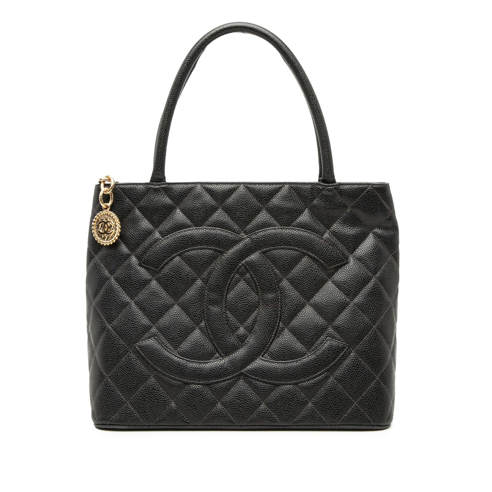 Black Caviar Leather Medallion Tote Bag by Chanel: Black Caviar Leather Medallion Tote Bag by Chanel This Chanel Caviar Medallion Tote features a quilted caviar leather body in black, rolled leather handles, a top zip closure, an exterior back slip po