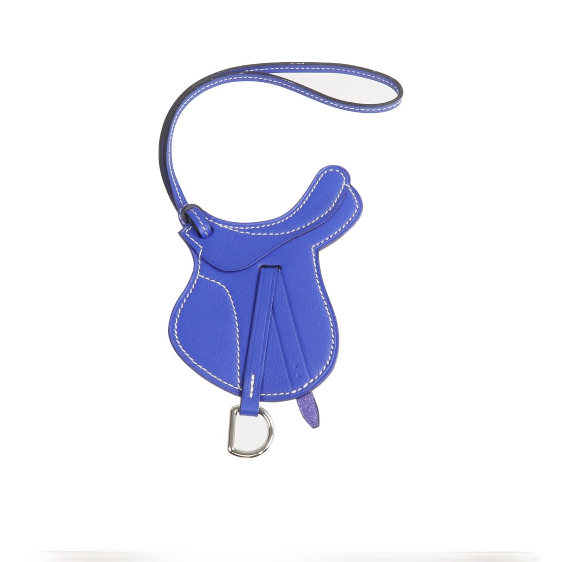 Hermes Paddock Selle charm in Bleu Electrique Swift leather: Hermes Paddock Selle charm in Bleu Electrique Swift leather This Hermes Paddock Selle charm is crafted from high-quality calfskin leather in a striking Bleu Electrique shade. Designed for women, this 