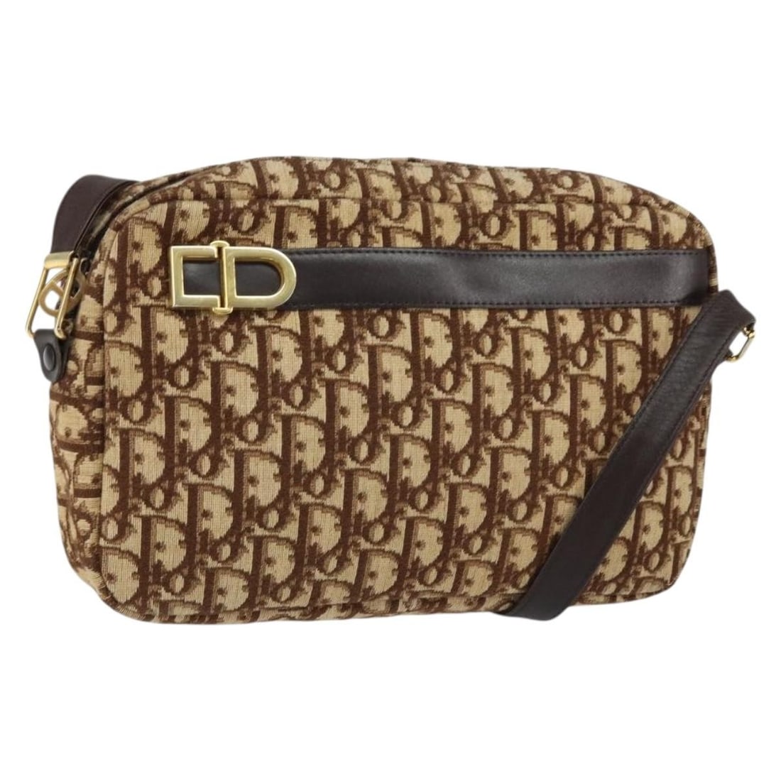 Brown Diorissimo Coated Canvas Crossbody Bag Christian Dior Vintage Model: Brown Diorissimo Coated Canvas Crossbody Bag Christian Dior Vintage Model This Christian Dior Vintage Trotter crossbody bag for women features Diorissimo coated canvas in brown with leather details. T