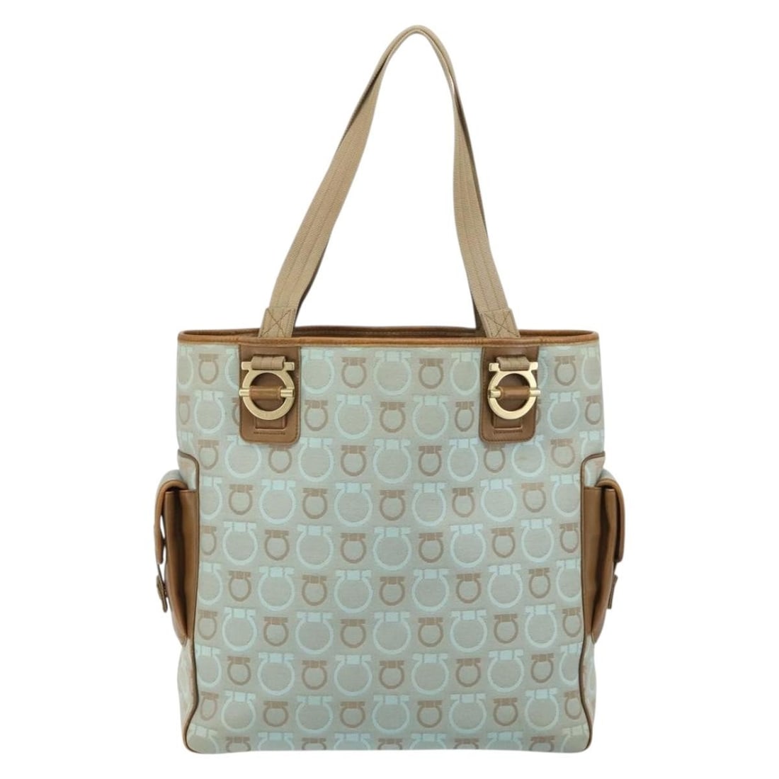 Blue Canvas Tote Bag by Salvatore Ferragamo with Gancini Detail: Blue Canvas Tote Bag by Salvatore Ferragamo with Gancini Detail This Salvatore Ferragamo Gancini Tote is crafted from blue canvas and designed for women. The tote features a spacious interior with poc