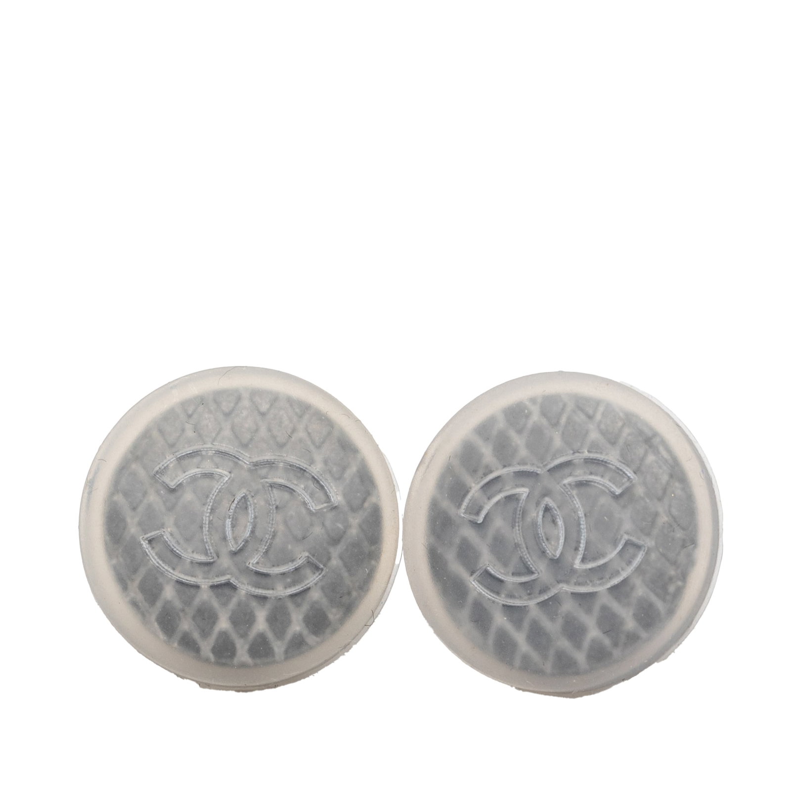 Chanel Quilted Gray Rubber Earrings with Silver Tone Button Design: Chanel Quilted Gray Rubber Earrings with Silver Tone Button Design These Chanel earrings feature a CC quilted design crafted from rubber and silver-tone metal with push back closures. The earrings are