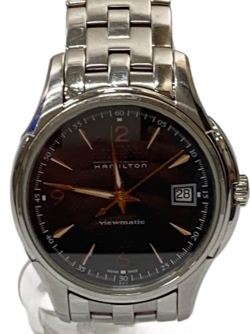 Hamilton Jazzmaster Stainless Steel Black Dial Wristwatch H324550: Hamilton Jazzmaster Stainless Steel Black Dial Wristwatch H324550 This HAMILTON Jazzmaster H324550 men's wristwatch features a black dial and a stainless steel case and band. Made in Switzerland, it i