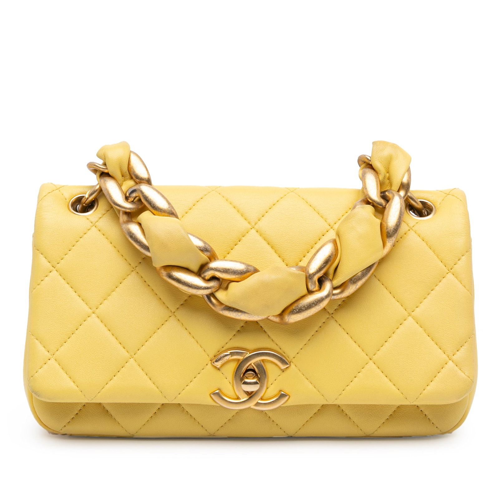 Chanel Yellow Quilted Lambskin Chain Is More Flap Bag: Chanel Yellow Quilted Lambskin Chain Is More Flap Bag This Chanel Quilted Lambskin Chain Is More Flap satchel showcases a luxurious quilted lambskin body in a vibrant yellow hue. The bag features a le