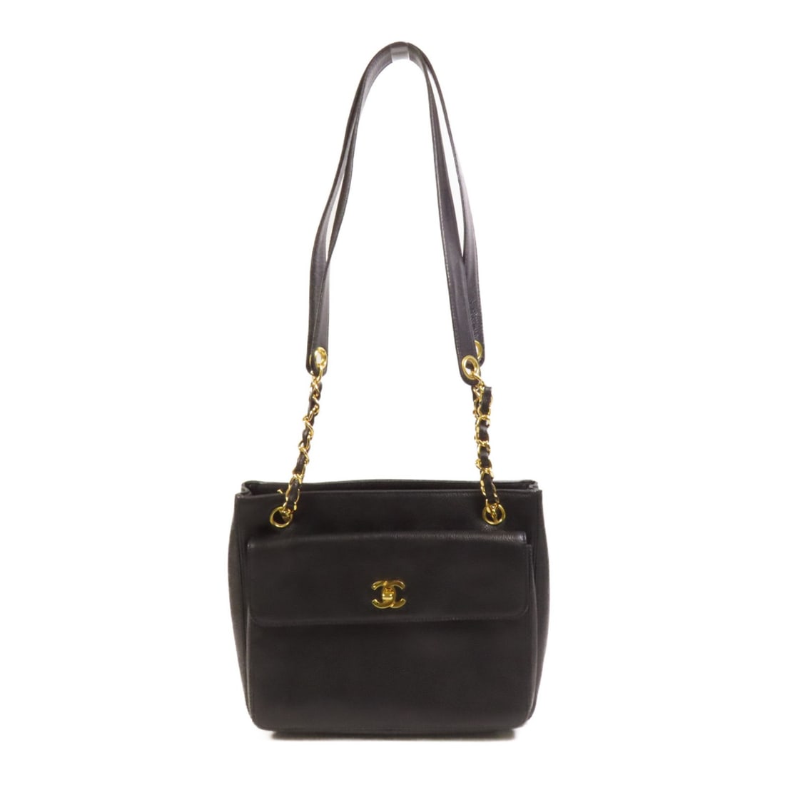 Black Calfskin Vintage Tote with Gold Hardware by CHANEL: Black Calfskin Vintage Tote with Gold Hardware by CHANEL This CHANEL vintage tote bag is crafted from black calfskin leather and features the iconic CC logo. The bag offers a classic tote silhouette w