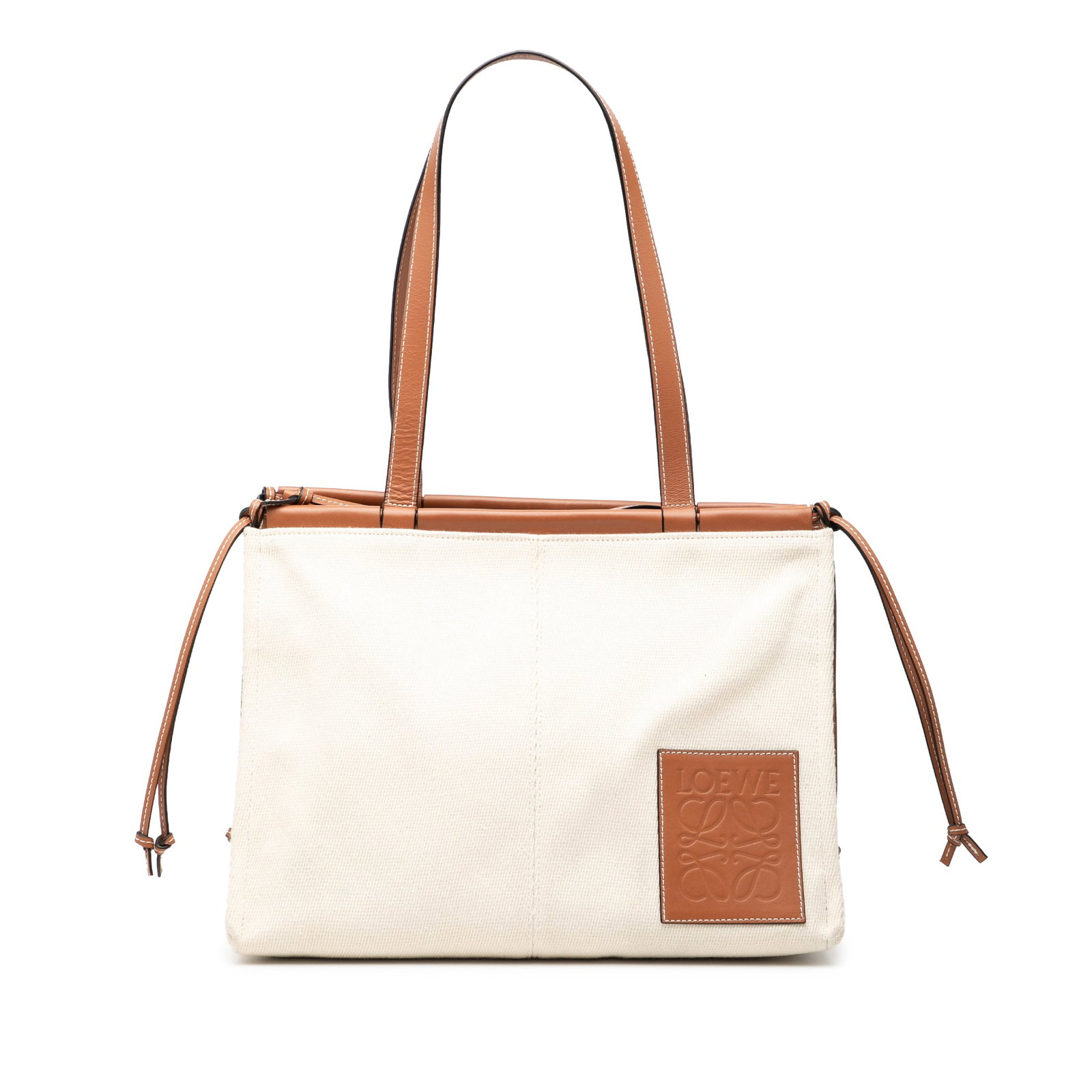 Loewe Small Cushion Tote Bag in Canvas with Leather Accents: Loewe Small Cushion Tote Bag in Canvas with Leather Accents This LOEWE Small Canvas Cushion Tote features a canvas body with a leather top panel and flat leather straps. It has an open top with a leat