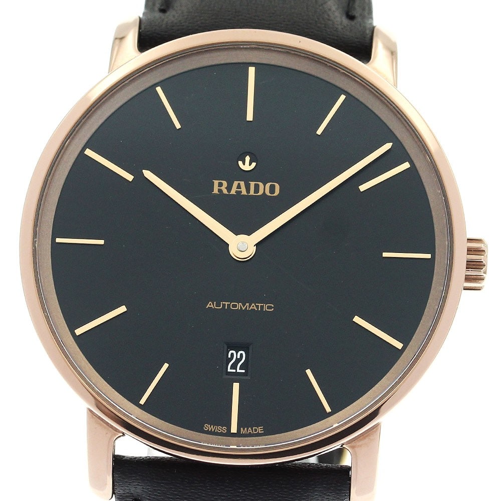 RADO DiaMaster Ceramos Date Automatic Men's Watch 40mm: RADO DiaMaster Ceramos Date Automatic Men's Watch 40mm This RADO DiaMaster Ceramos men's wristwatch features a durable ceramic and gold-plated case paired with an unused aftermarket leather strap. The