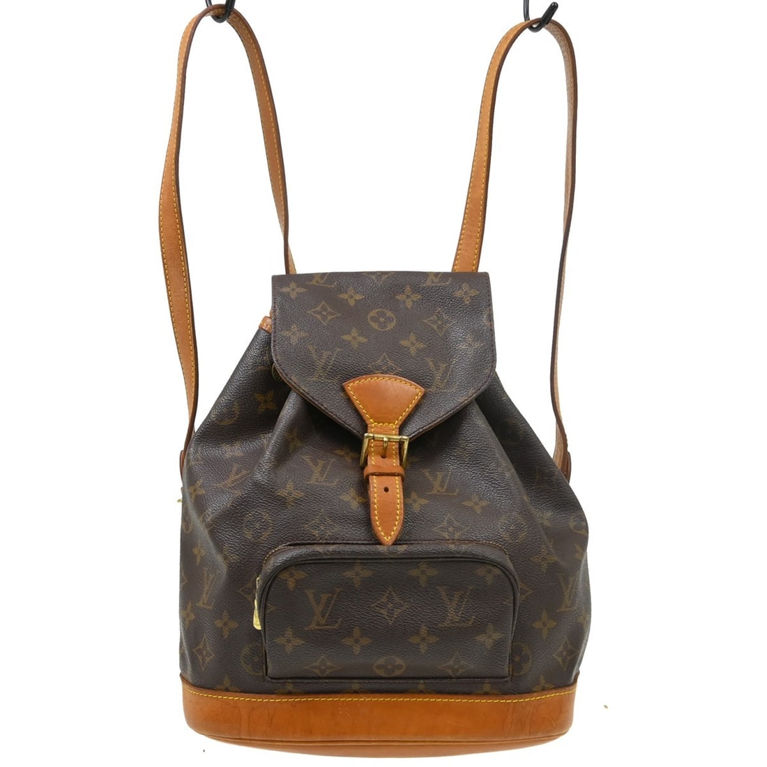 Louis Vuitton Montsouris MM Monogram Canvas Backpack: Louis Vuitton Montsouris MM Monogram Canvas Backpack This Louis Vuitton Montsouris MM backpack features the iconic monogram canvas leather exterior with beige shoulder straps and a classic flap buckle