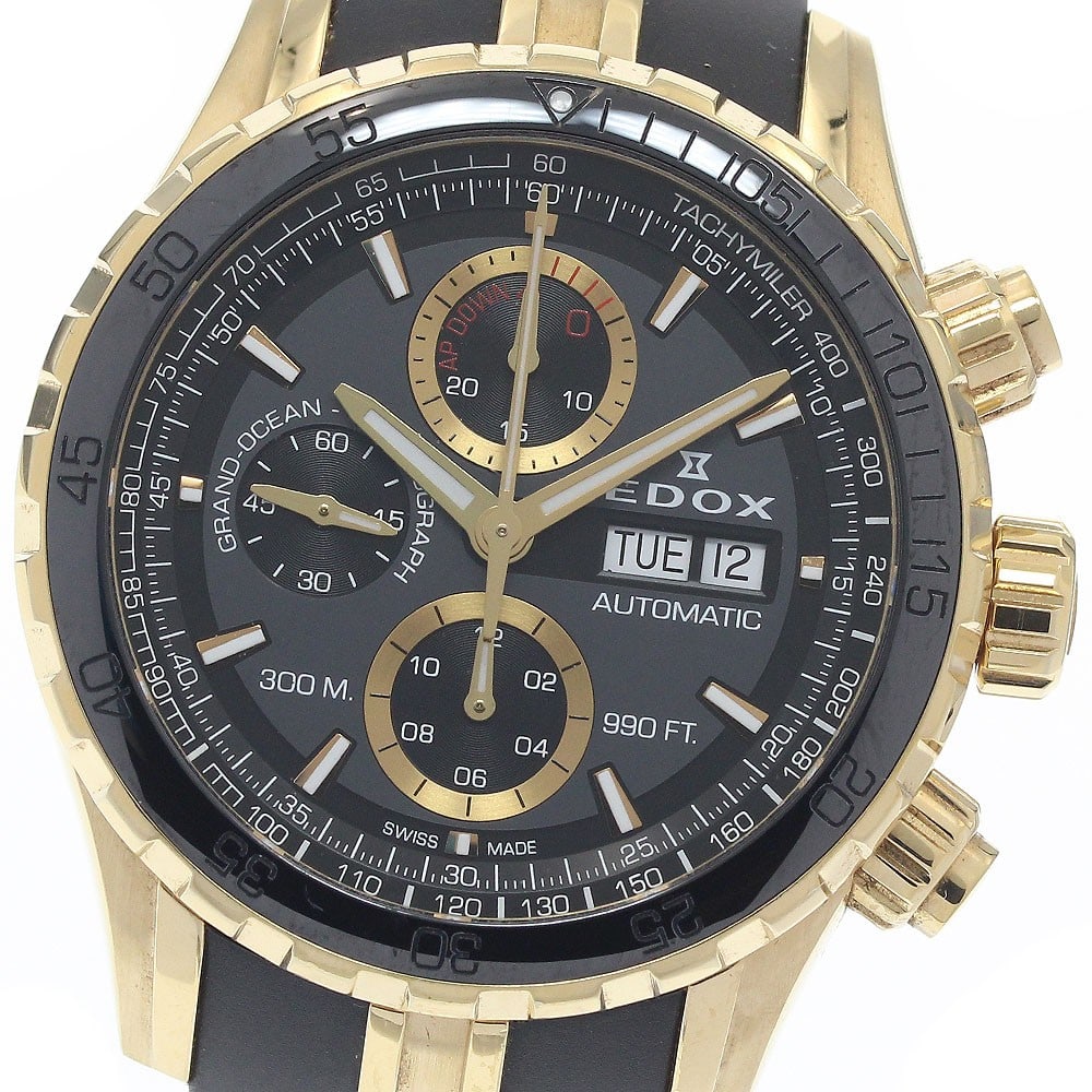 EDOX Grand Ocean Automatic Chronograph Day-Date Men's Wristwatch: EDOX Grand Ocean Automatic Chronograph Day-Date Men's Wristwatch This EDOX Grand Ocean Chronograph Day-Date men's wristwatch features a robust stainless steel and gold-plated case paired with a durabl