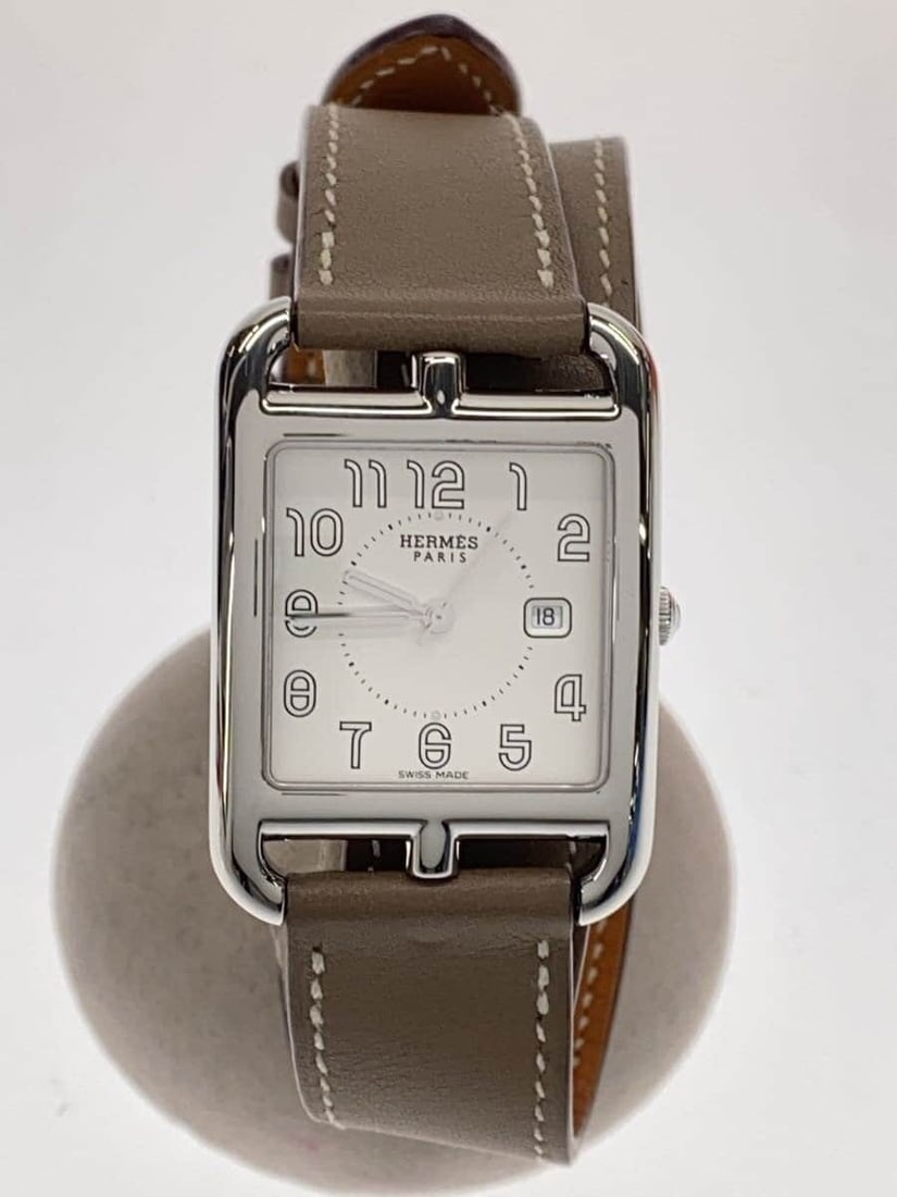 Hermes Cape Cod Double Tour White Ladies Wristwatch: Hermes Cape Cod Double Tour White Ladies Wristwatch This Hermes Cape Cod Double Tour CC2.710 women's wristwatch features a white case and a distinctive double tour strap design. Made in Switzerland, t