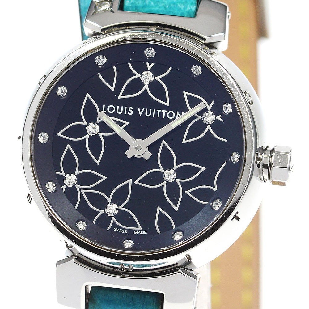 Louis Vuitton Tambour Lovely Quartz Ladies Watch Q121G: Louis Vuitton Tambour Lovely Quartz Ladies Watch Q121G This Louis Vuitton Tambour Lovely women's wristwatch features a stainless steel case paired with a black leather strap. The watch is powered by a