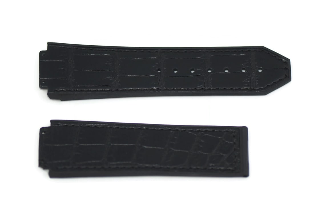 Hublot Black Leather Watch Strap 25x22mm Authentic: Hublot Black Leather Watch Strap 25x22mm Authentic This Hublot black leather strap is a sophisticated accessory designed for wristwatches. Made from high-quality leather, it features a sleek black col