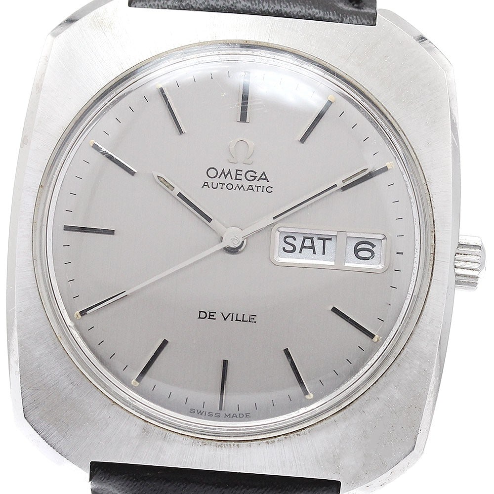 Omega De Ville Automatic Day Date Men's Wristwatch: Omega De Ville Automatic Day Date Men's Wristwatch This OMEGA De Ville Day Date men's wristwatch features a stainless steel case and a silver dial, complemented by a leather bracelet. The watch is equ