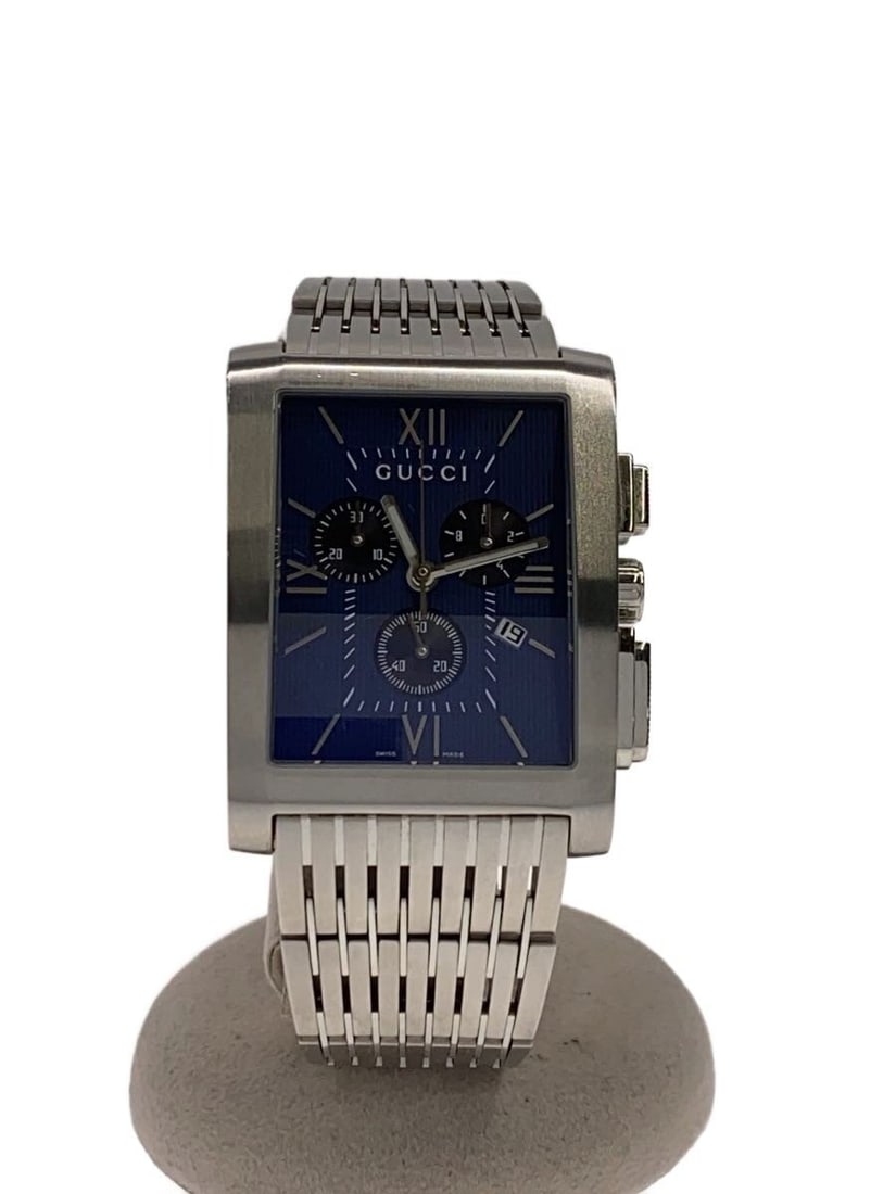 Gucci G-metro 8600M Swiss Men's Wristwatch: Gucci G-metro 8600M Swiss Men's Wristwatch This GUCCI G-metro Quartz 8600M men's wristwatch features a Swiss-made quartz movement and a rectangular case design. The watch is in slightly used condition