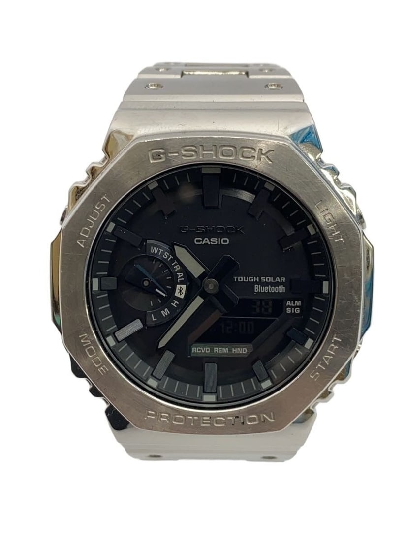 Casio G Shock Stainless Steel Wristwatch GM B2100: Casio G Shock Stainless Steel Wristwatch GM B2100 This CASIO G-SHOCK GM-B2100 men's wristwatch features a durable stainless steel case and band, designed for everyday wear. Made in Japan, it is pre-ow